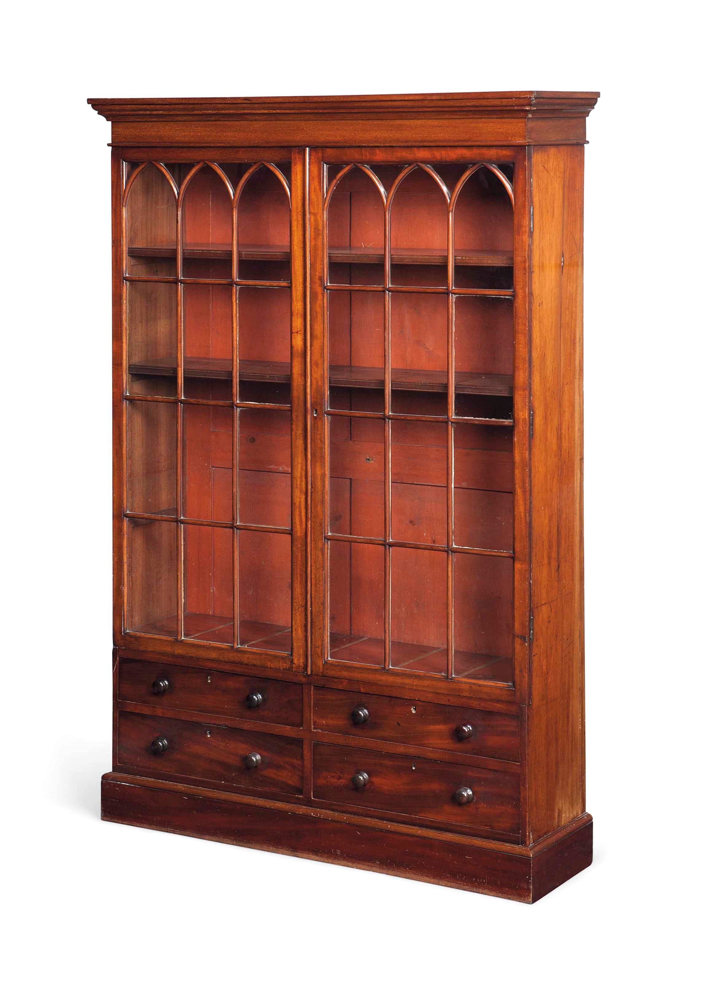 A SMALL VICTORIAN GLAZED BOOKCASE