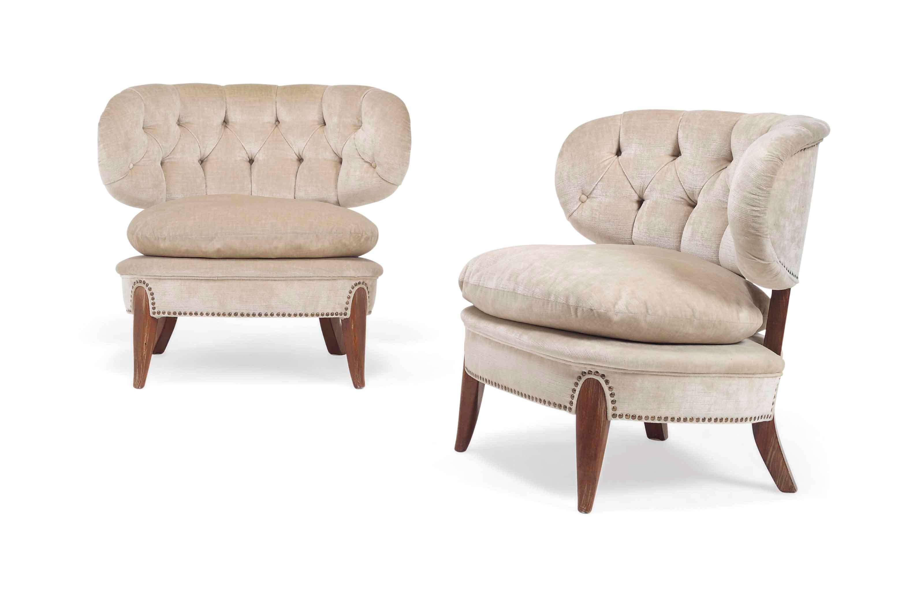 A PAIR OF BEECH OCCASIONAL LOW CHAIRS