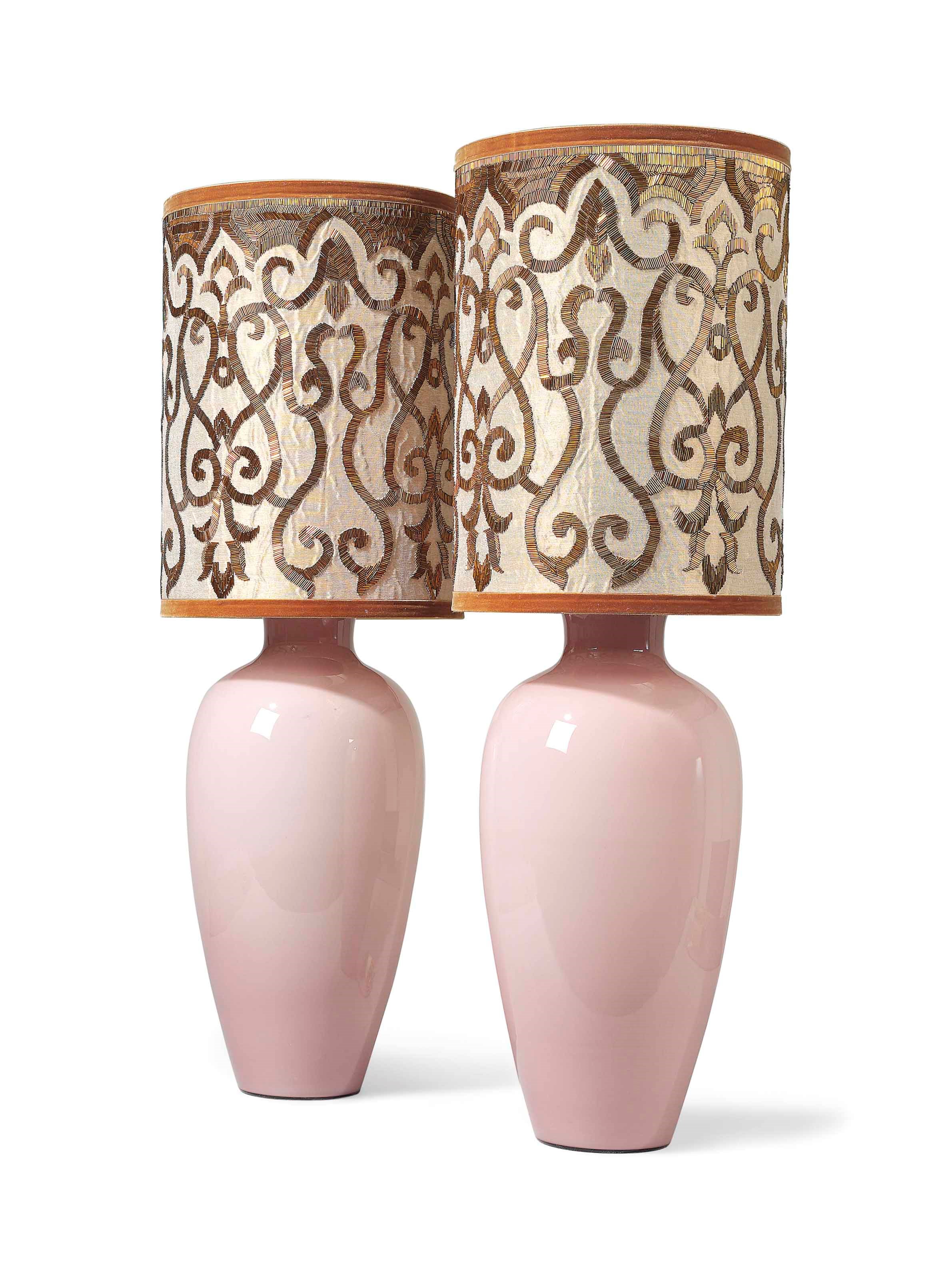 A PAIR OF PINK GLASS TABLE LAMPS