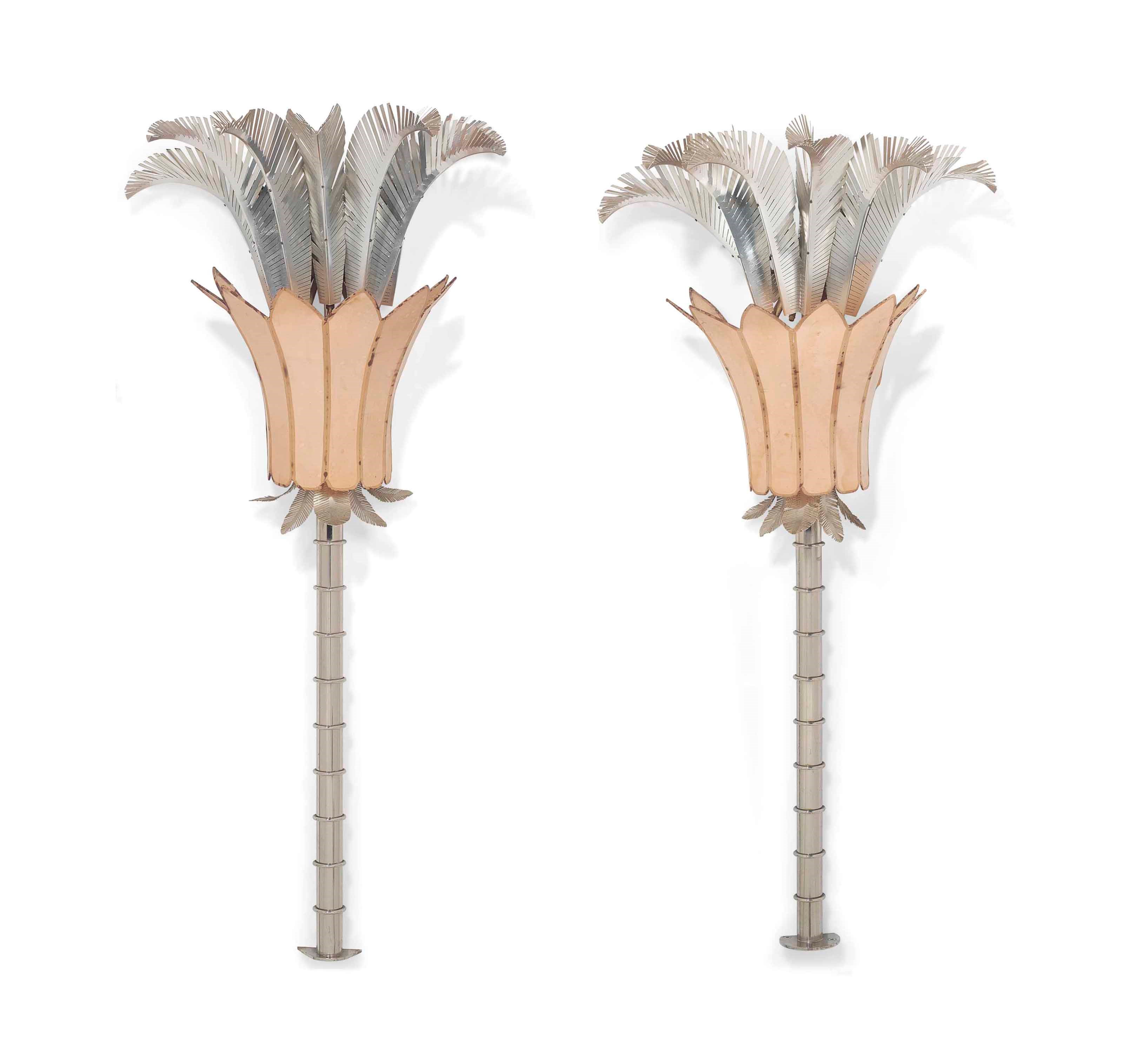 A PAIR OF CUT ALUMINIUM AND SILVERED METAL WALL-LIGHTS