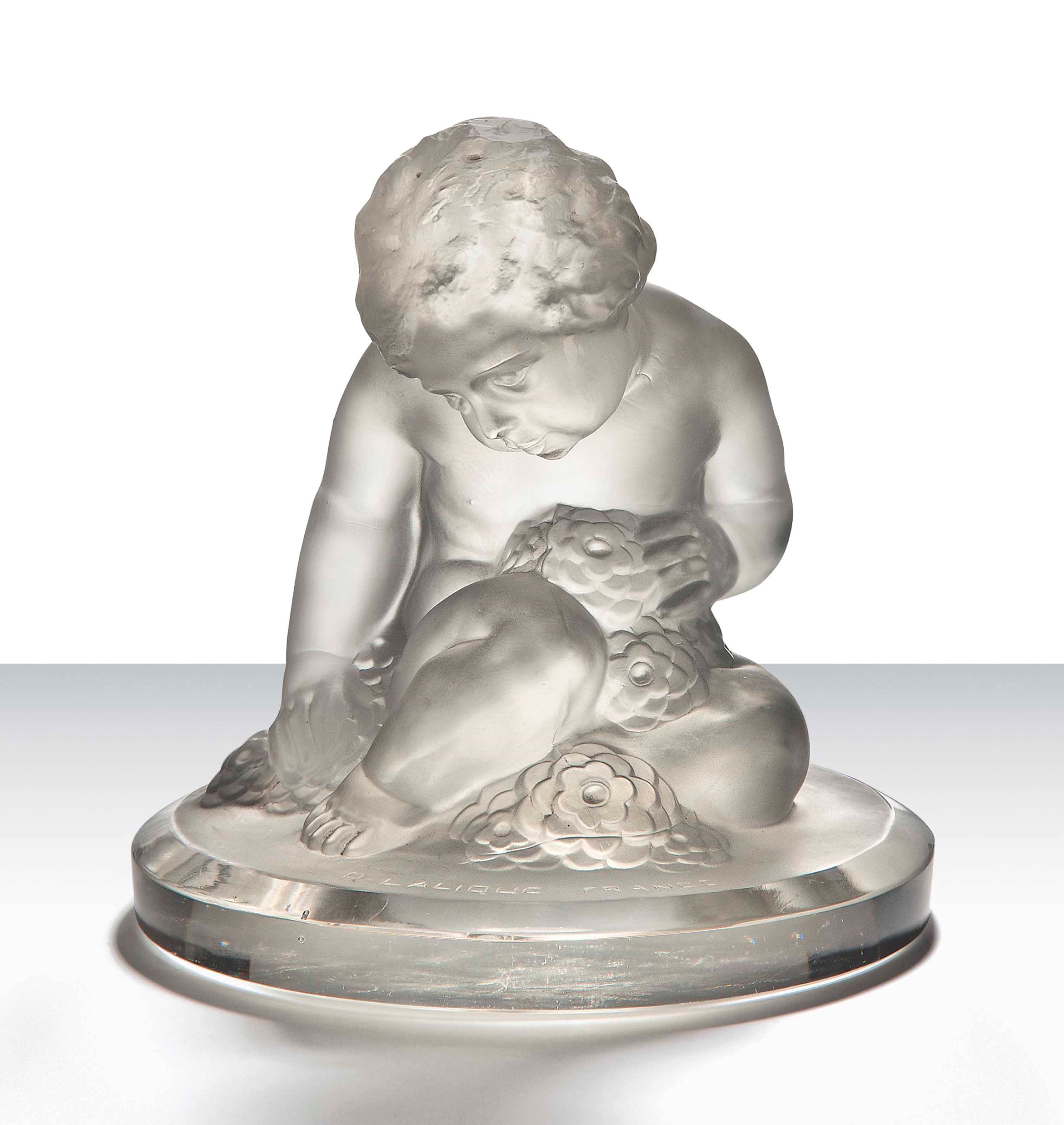 ENFANT STATUETTE, G