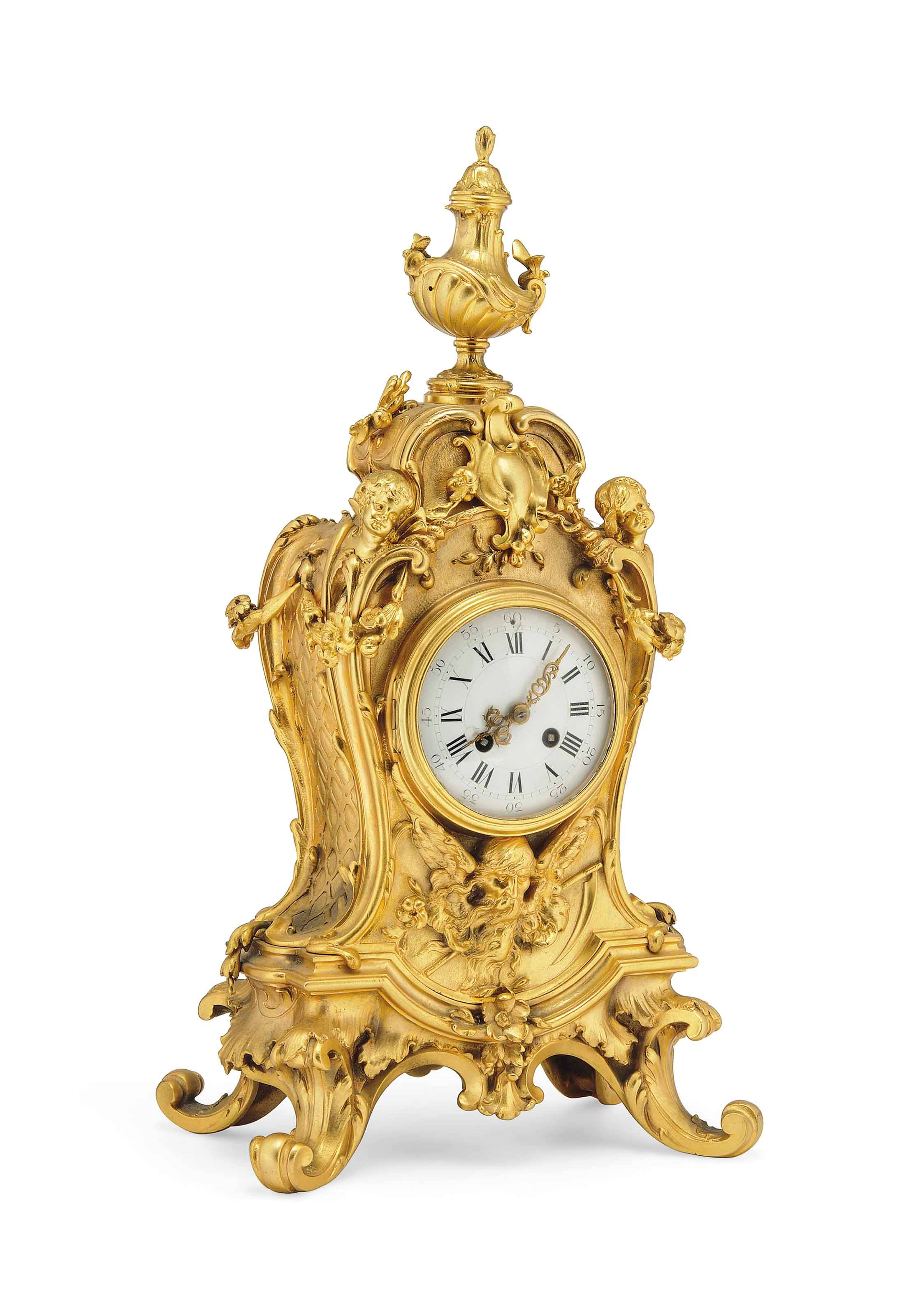 A FRENCH GILT-SPELTER STRIKING MANTEL CLOCK