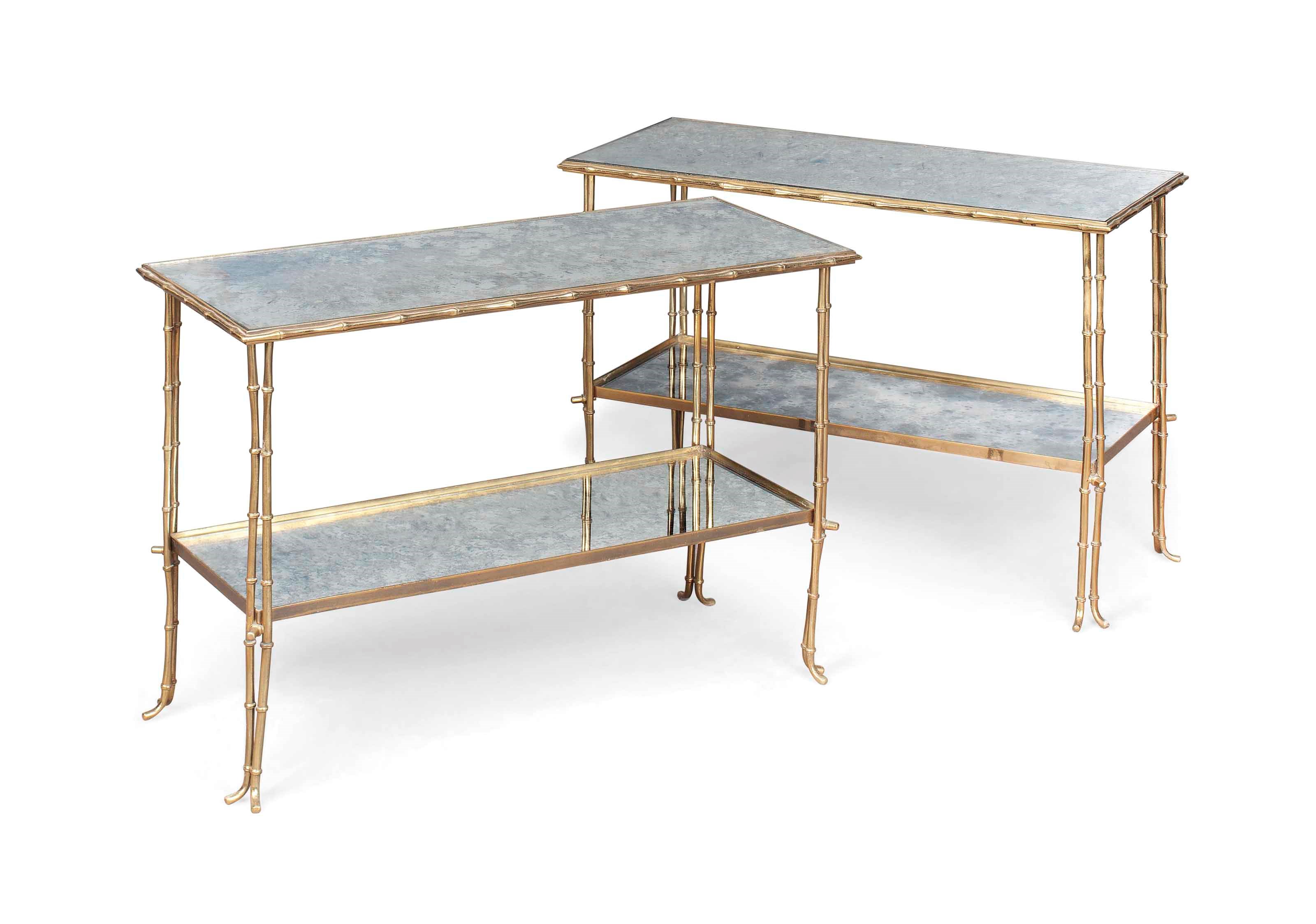 A PAIR OF MAISON BAGUES BRONZE AND GLASS SOFA TABLES