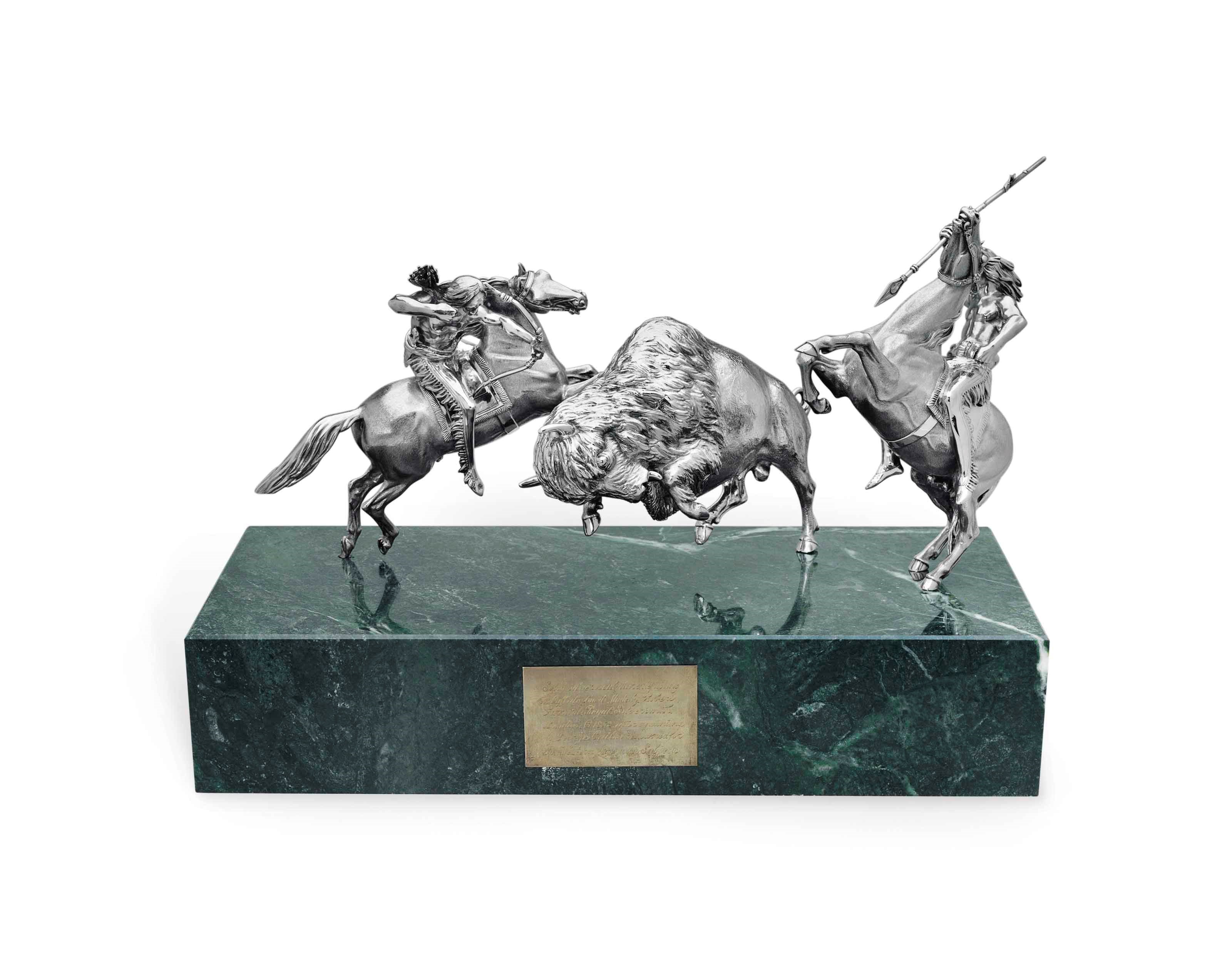 A VICTORIAN SILVER SCULPTURAL GROUP ON A LATER MARBLE BASE