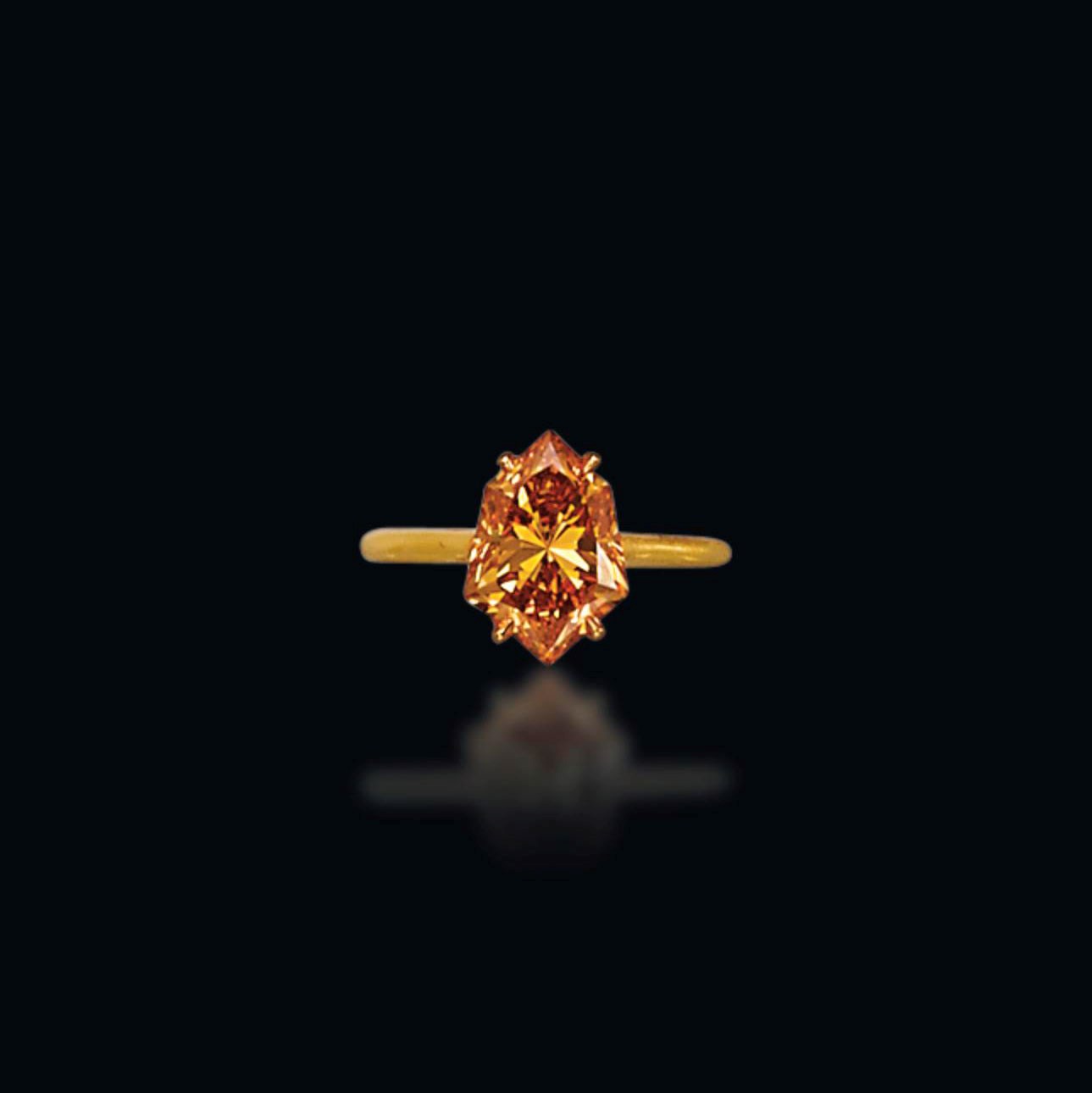 A COLOURED DIAMOND RING