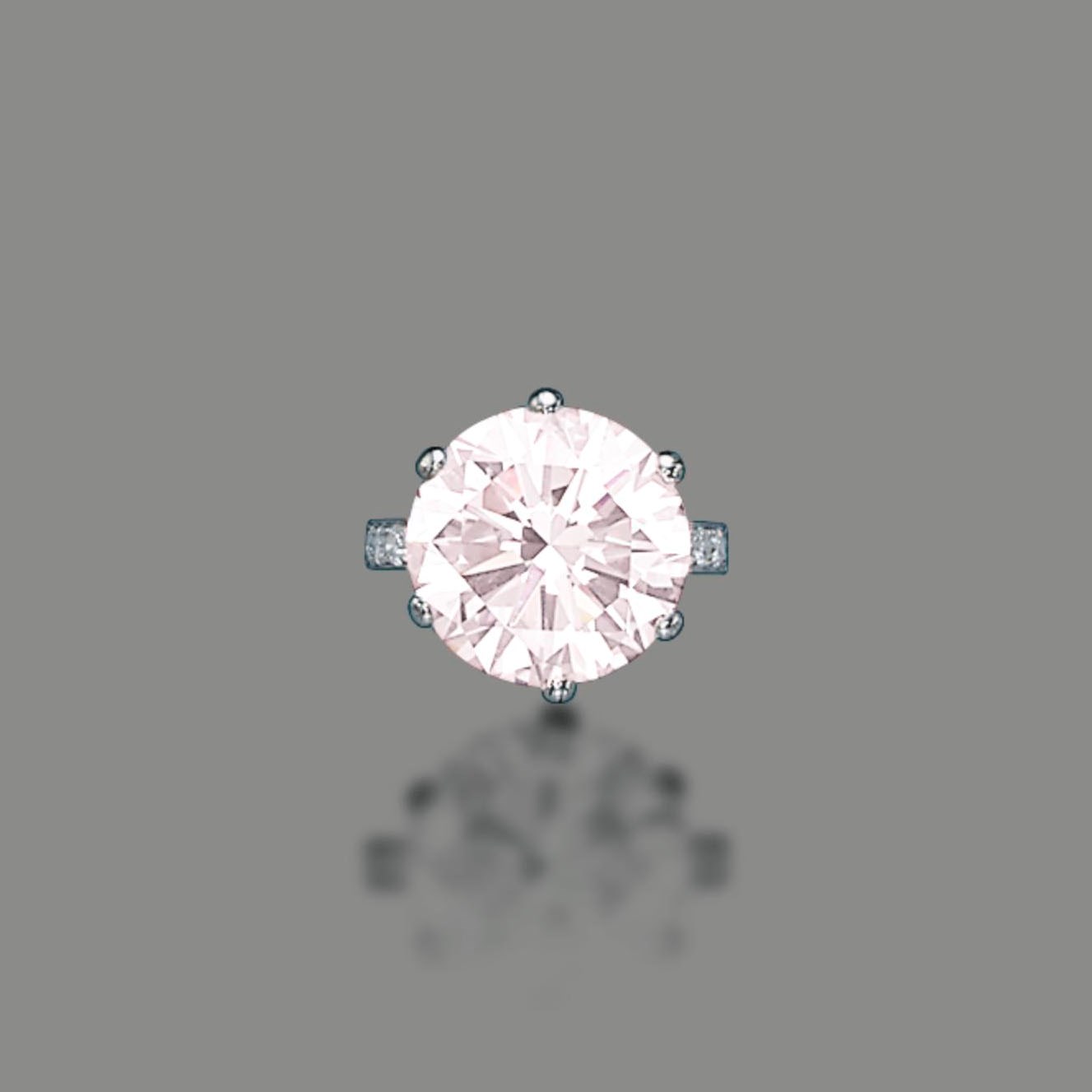 A COLOURED DIAMOND RING