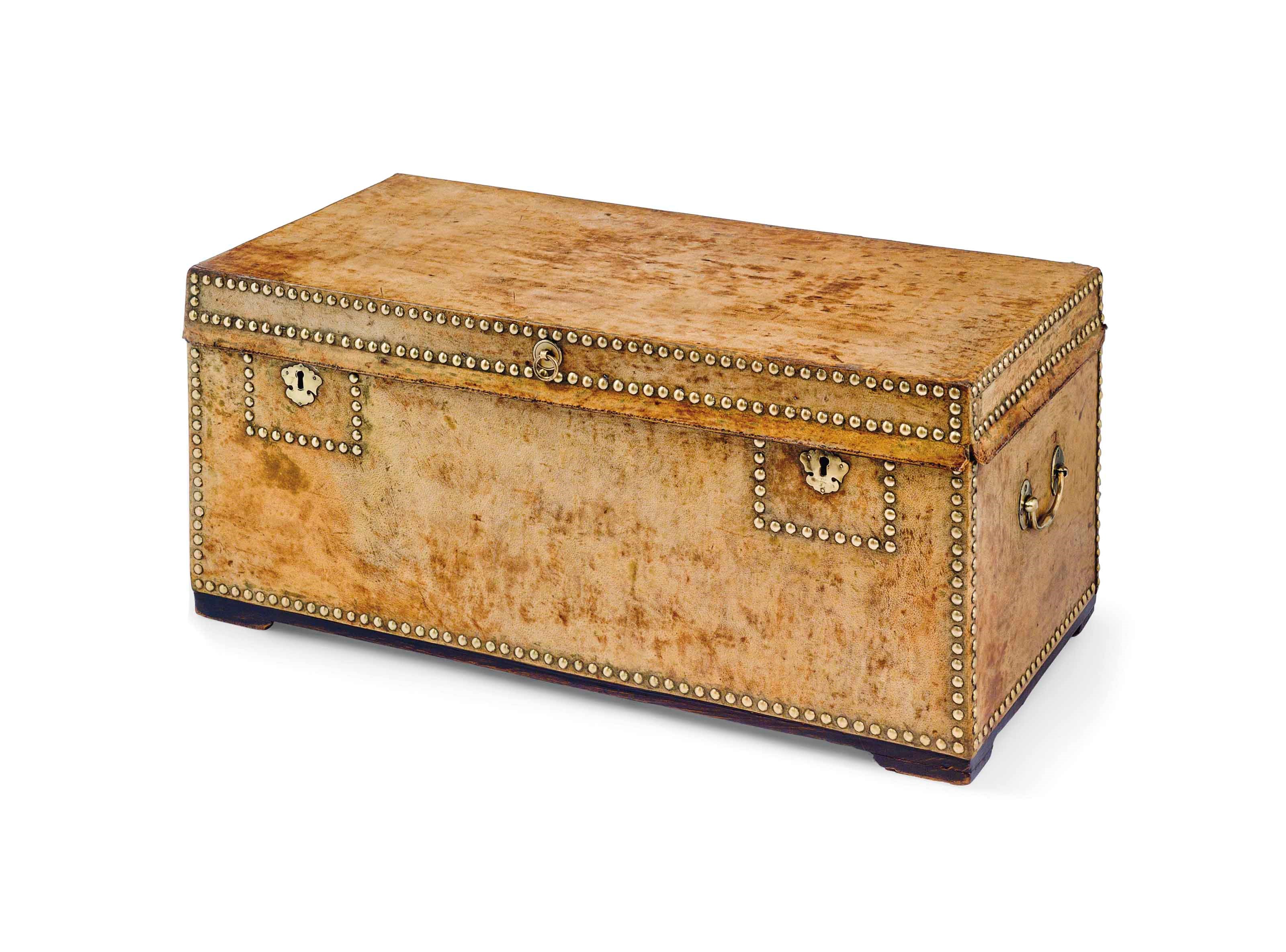 A BRASS-STUDDED VELLUM-COVERED TRUNK