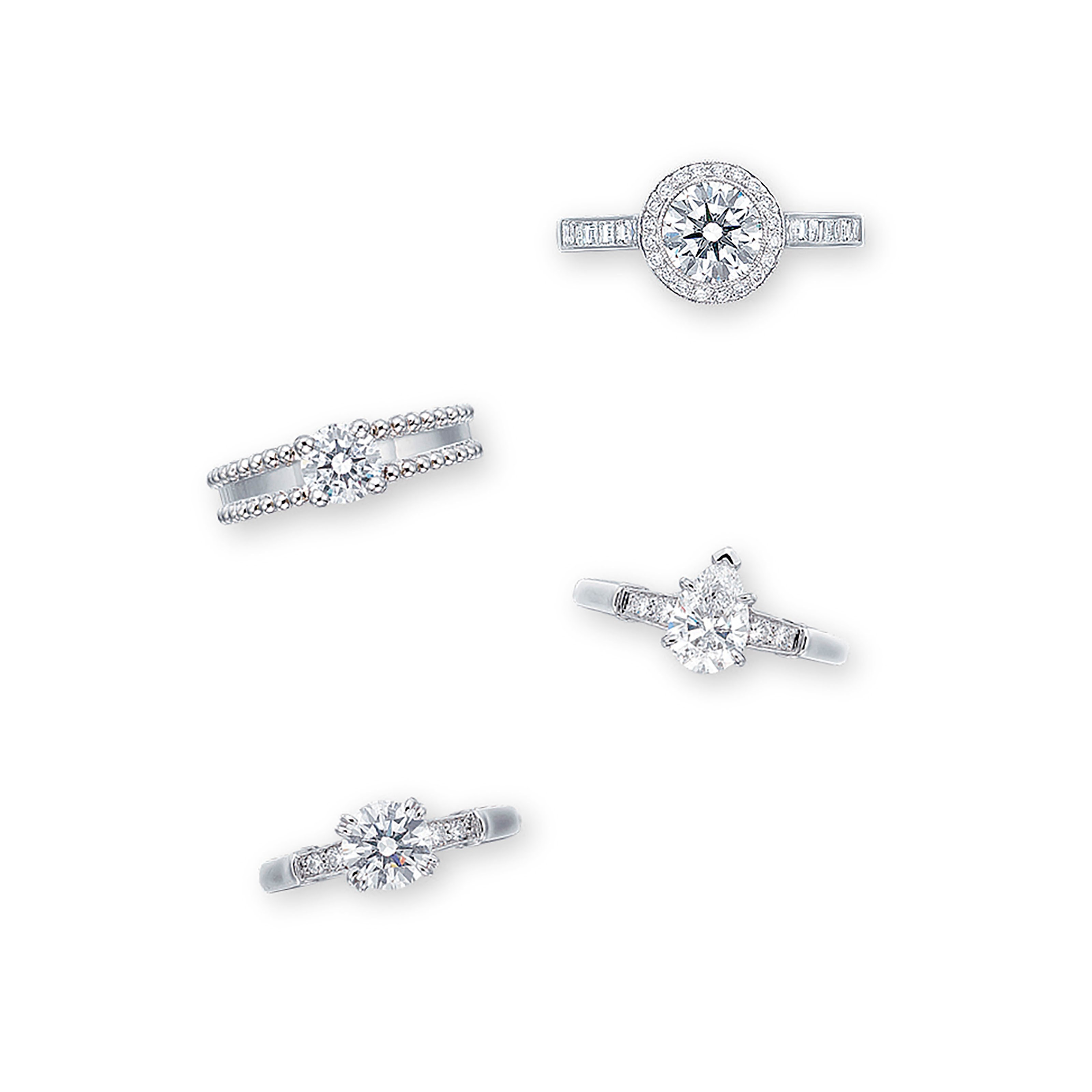 FOUR SIGNED DIAMOND RINGS