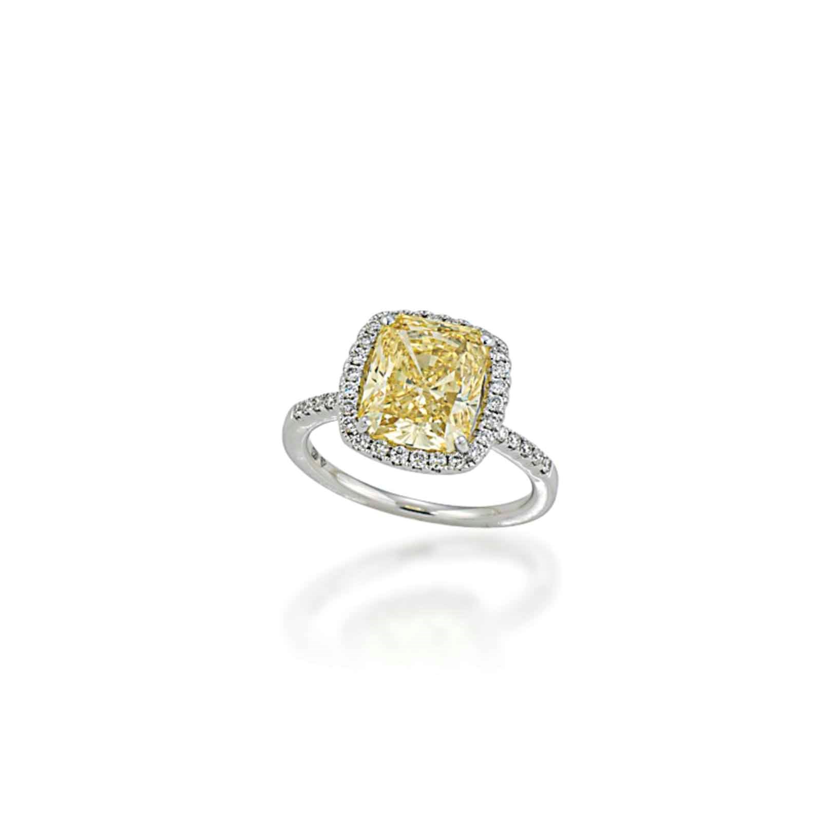 A YELLOW DIAMOND RING