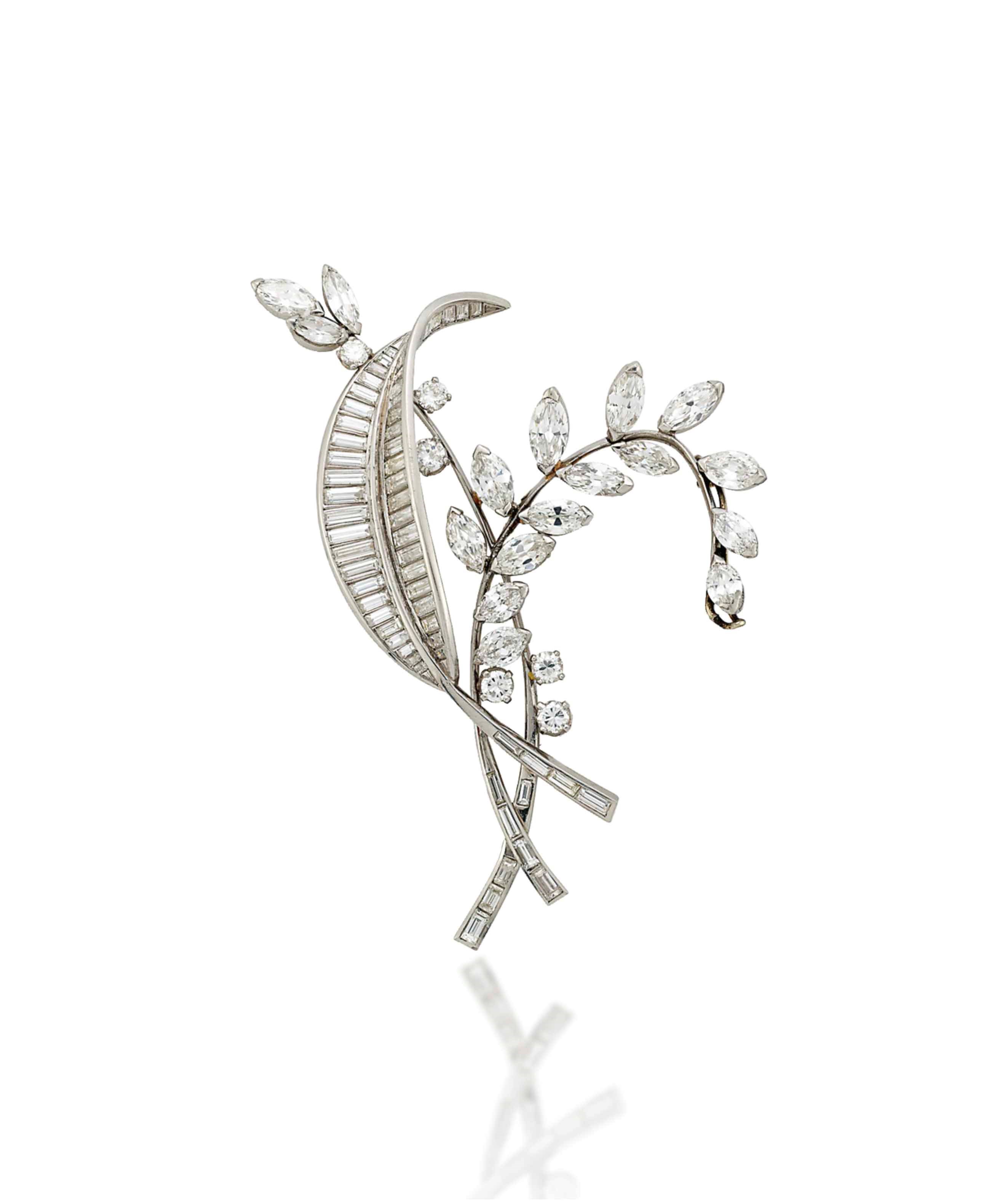 A DIAMOND CLIP BROOCH
