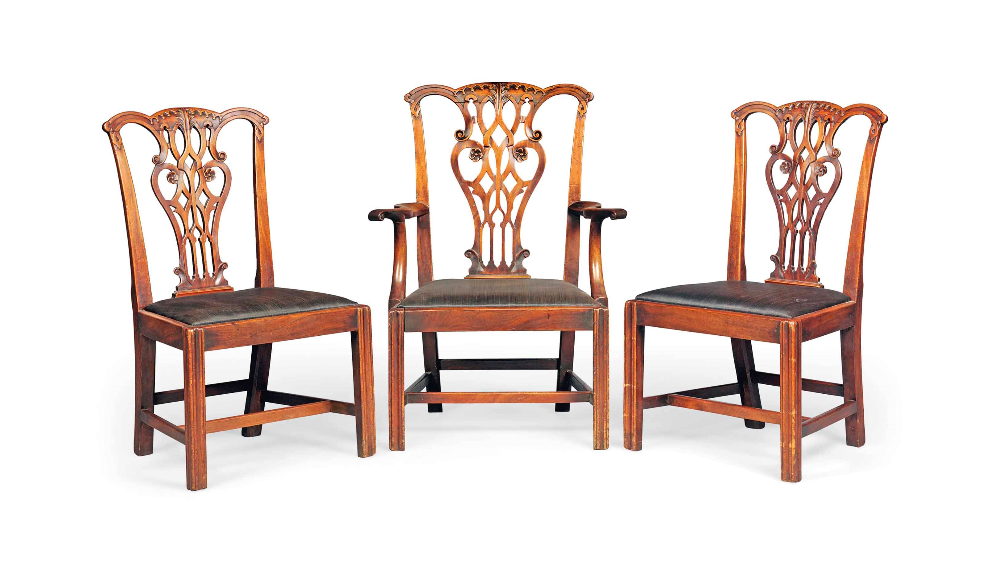 A SET OF THREE GEORGE III MAHOGANY DINING-CHAIRS