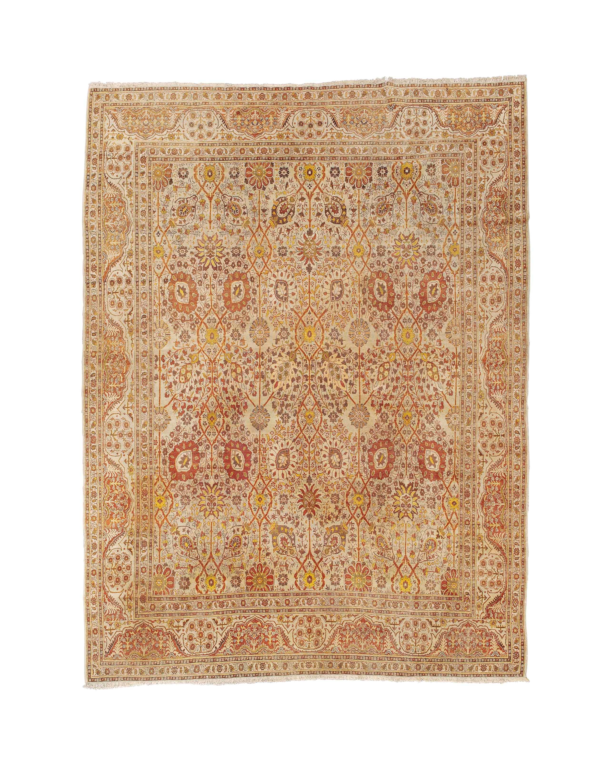 An antique Tabriz carpet