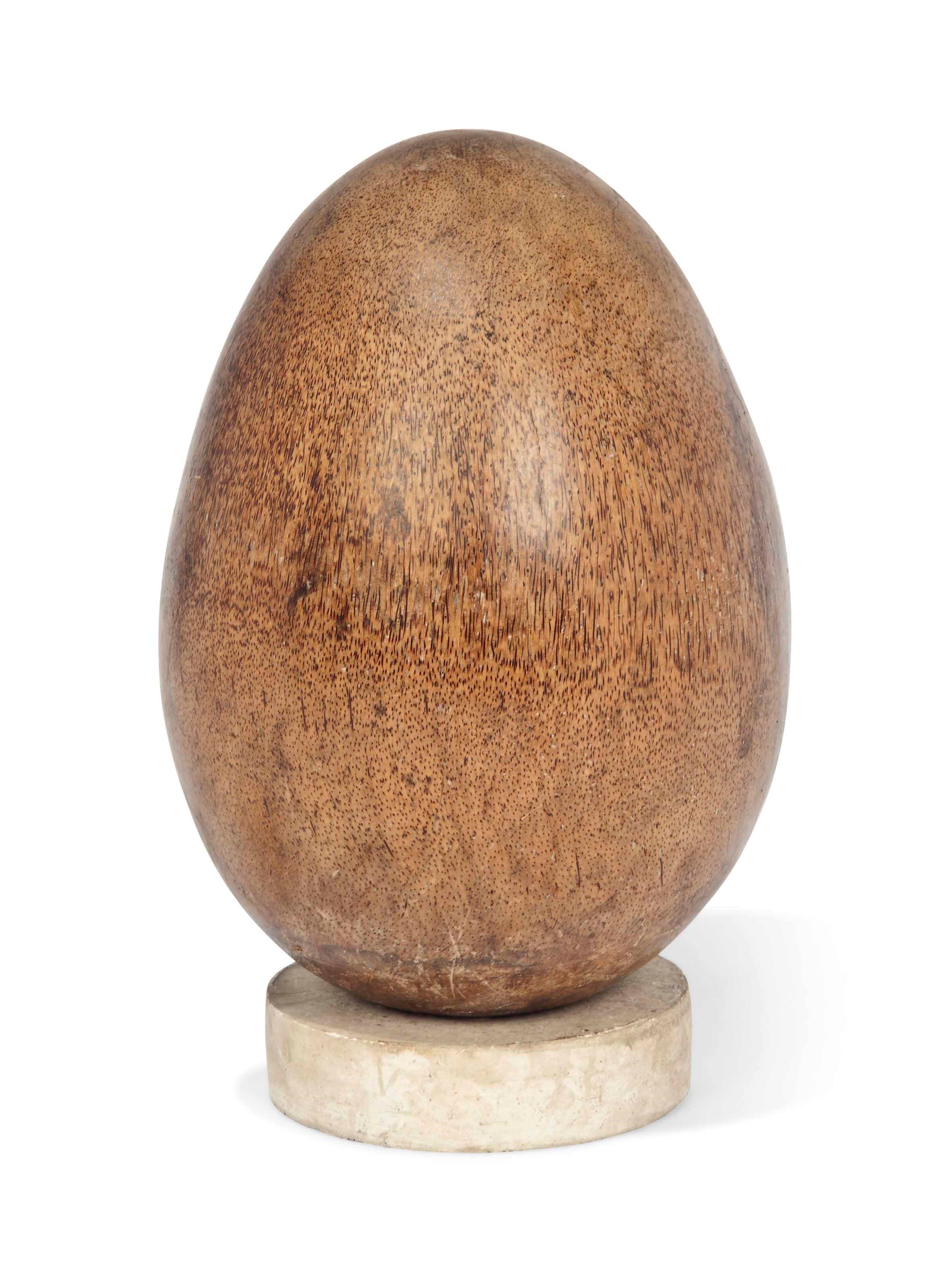 A LARGE PALMWOOD EGG
