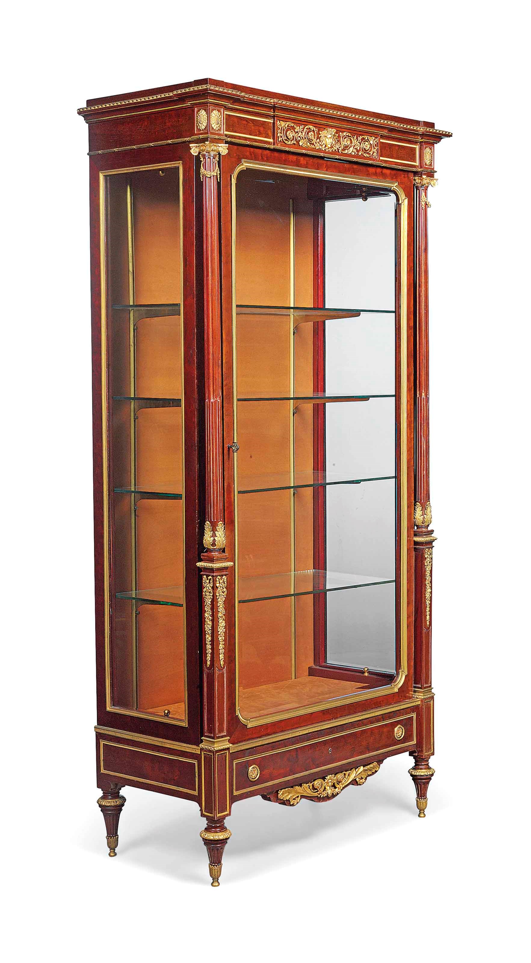 A FRENCH ORMOLU-MOUNTED PLUM-PUDDING MAHOGANY VITRINE CABINET