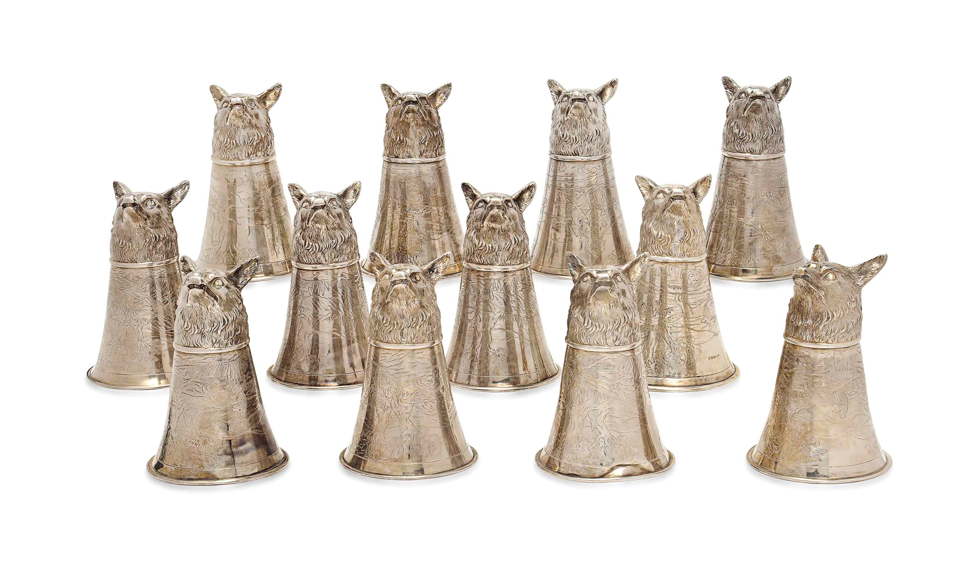 A MATCHED SET OF TWELVE GERMAN SILVER STIRRUP CUPS