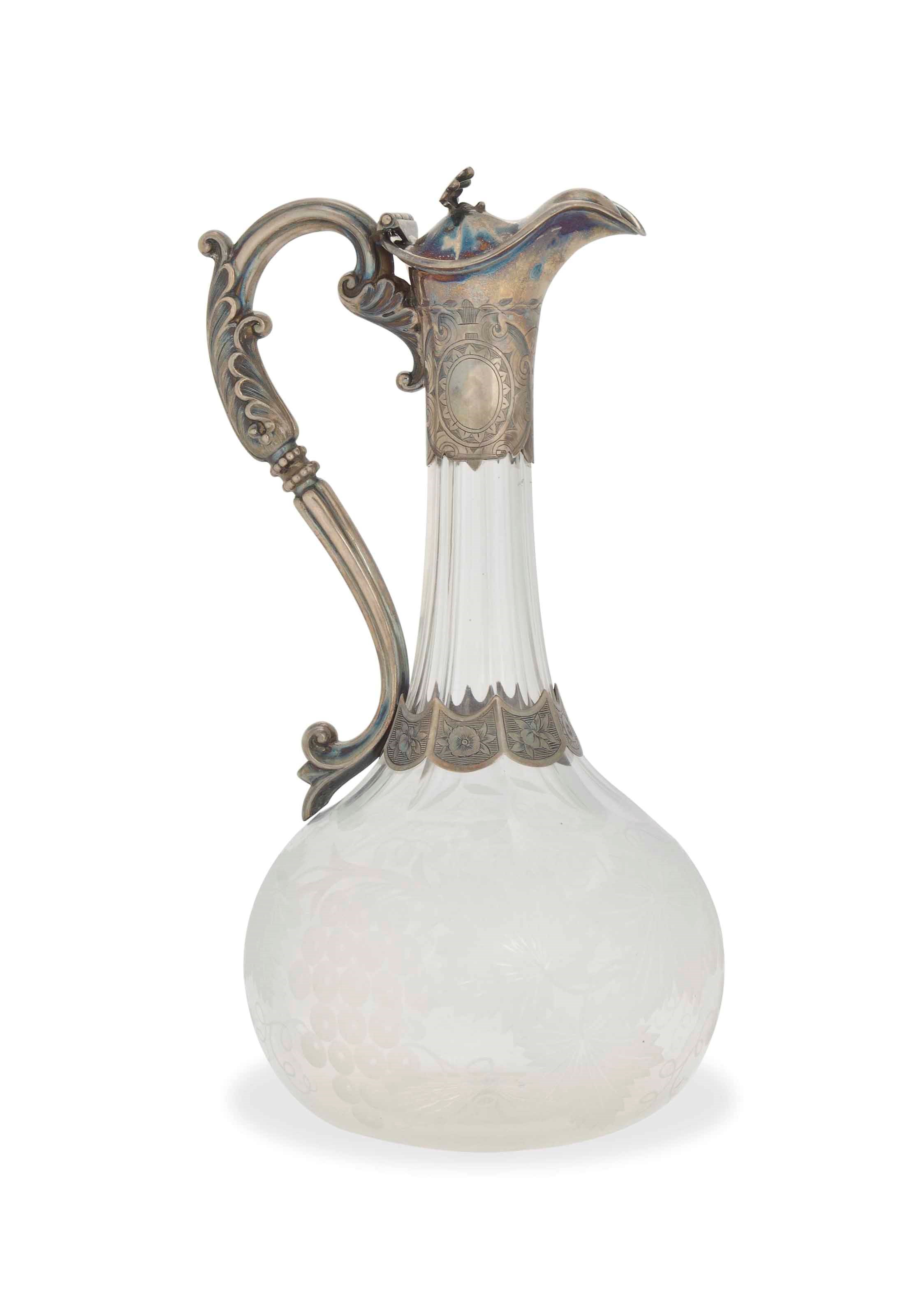 A VICTORIAN SILVER-MOUNTED ENGRAVED-GLASS CLARET JUG