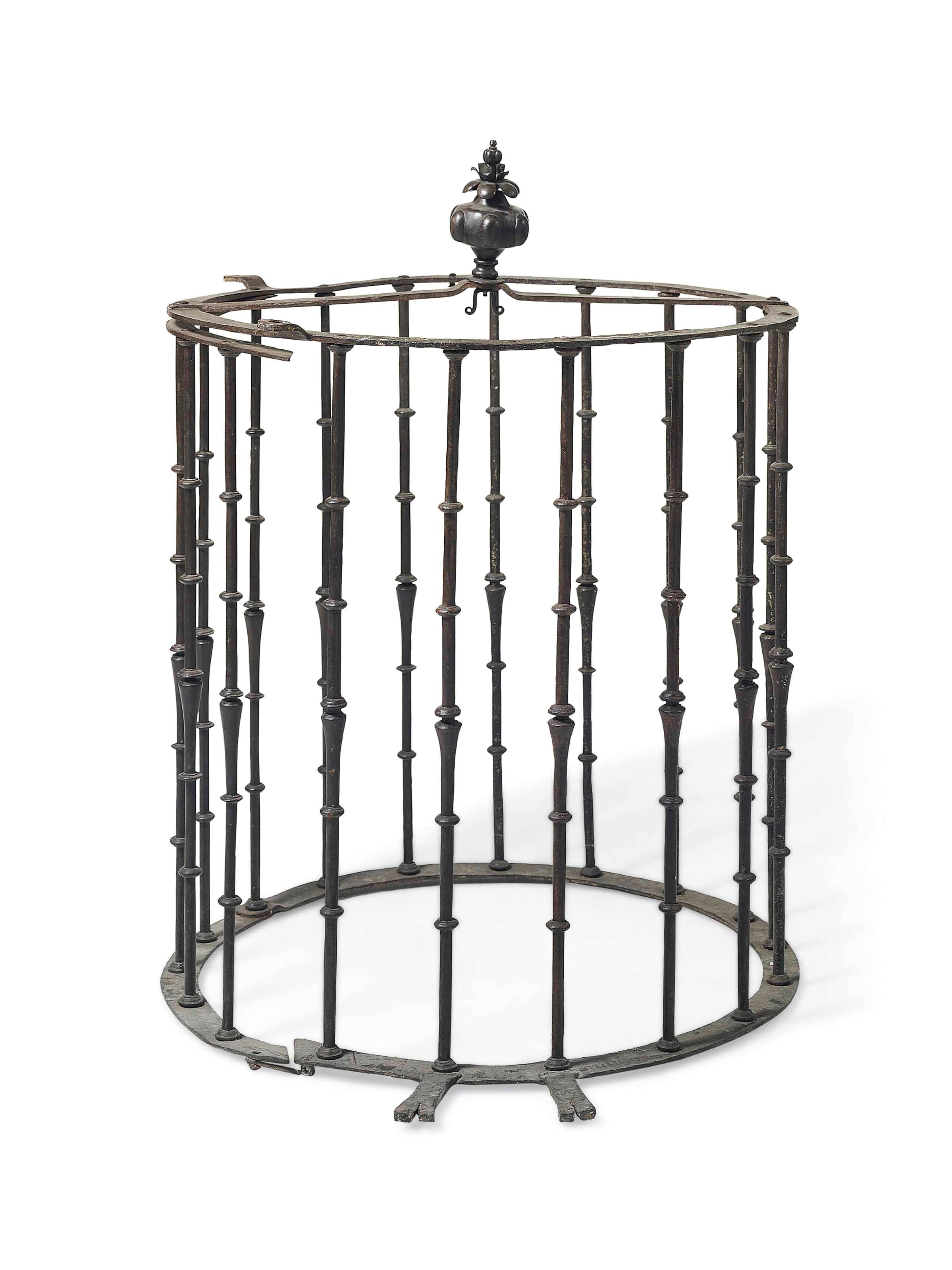 A CONTINENTAL WROUGHT-IRON WELL HEAD