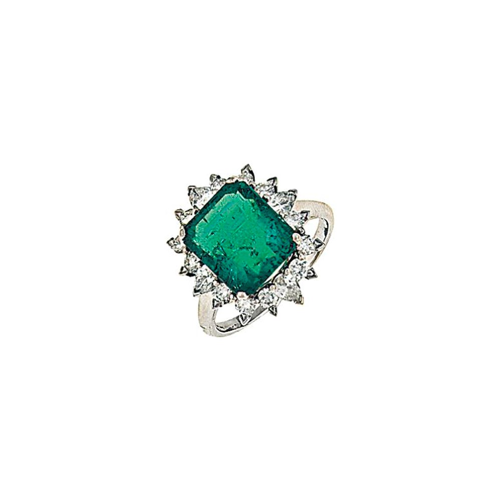 An emerald and diamond ring