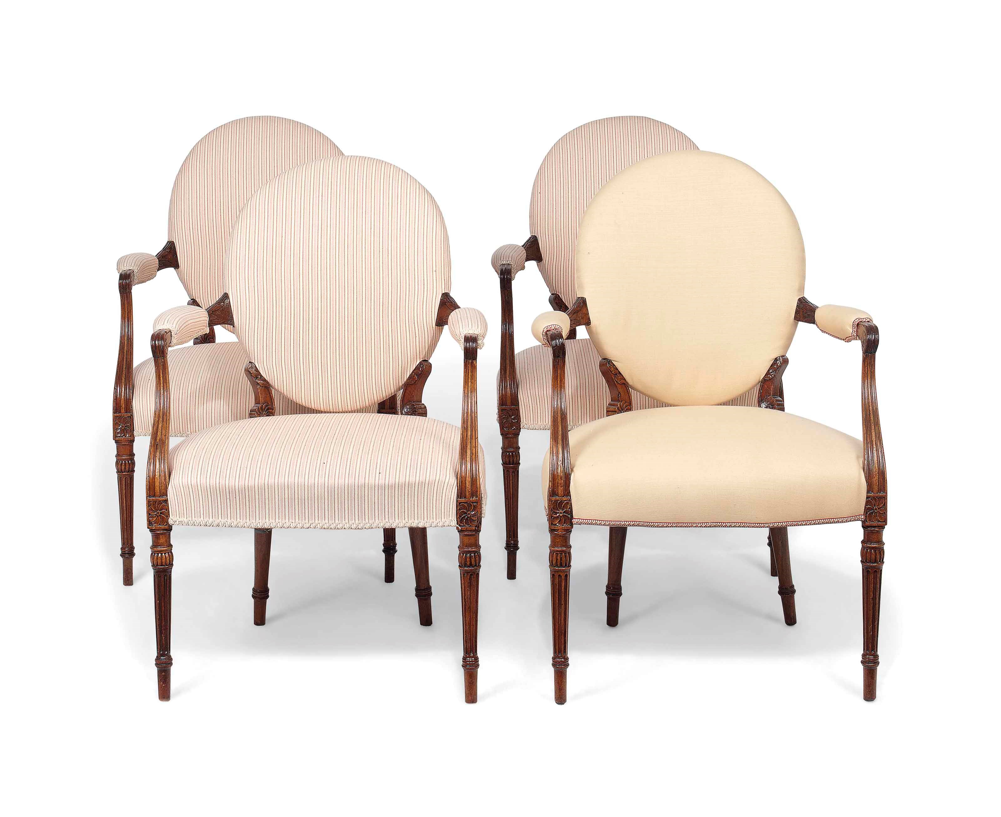 A SET OF FOUR GEORGE III MAHOGANY OPEN ARMCHAIRS