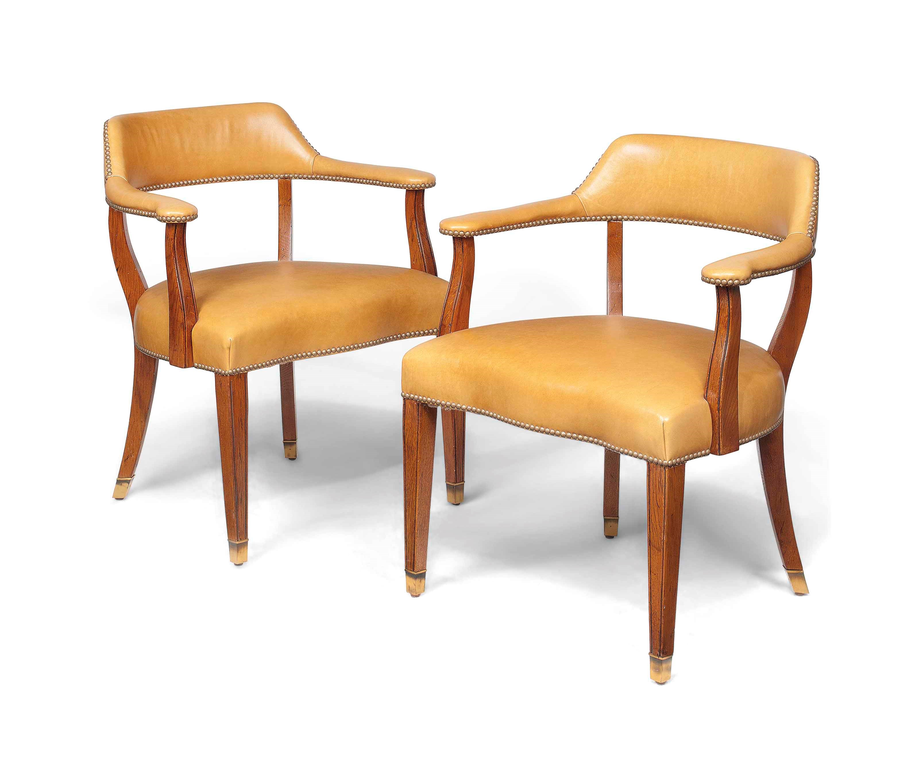 A PAIR OF OAK DESK CHAIRS
