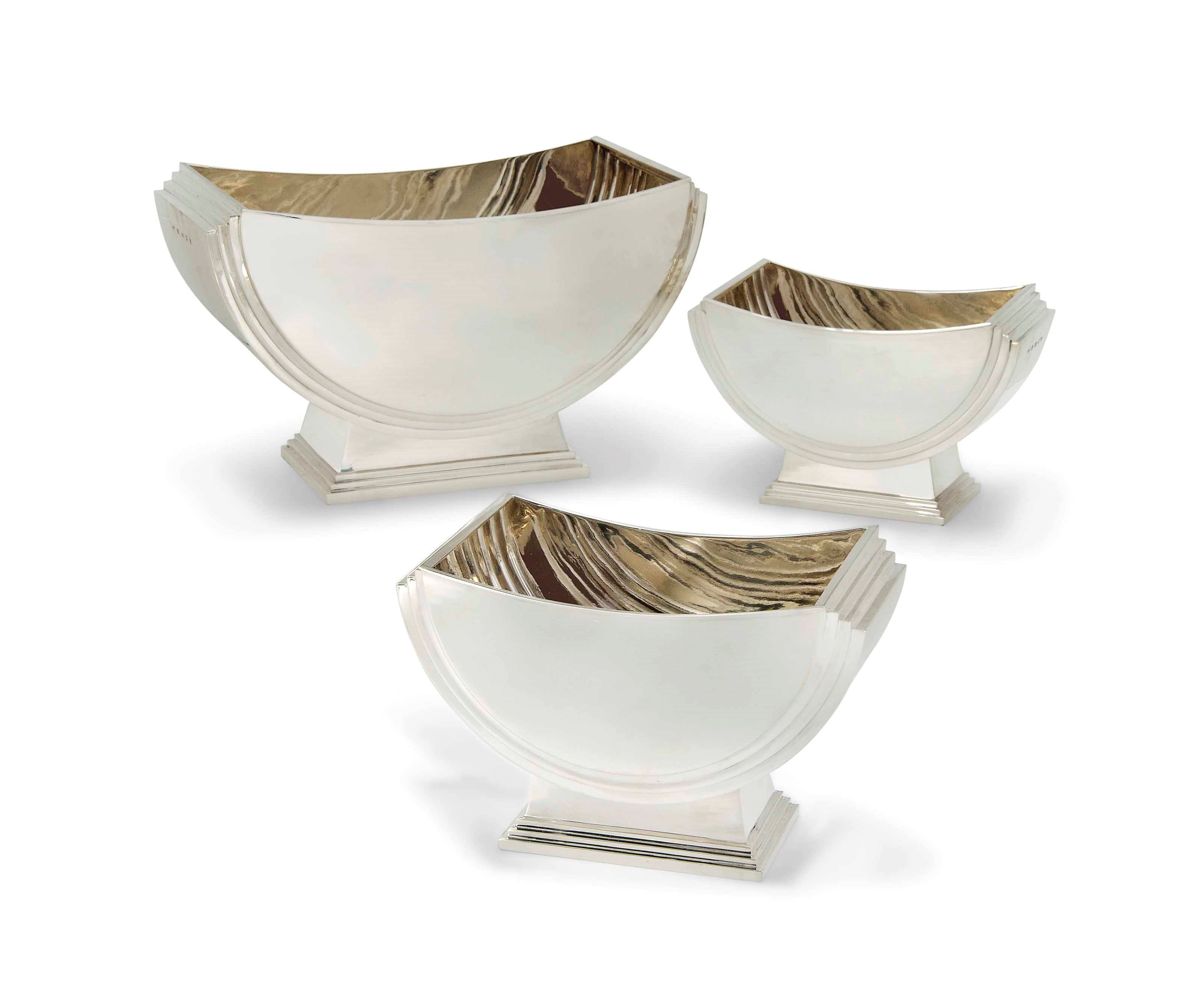 A SUITE OF THREE LARGE MODERN SILVER JARDINIERES IN THE ART DECO STYLE