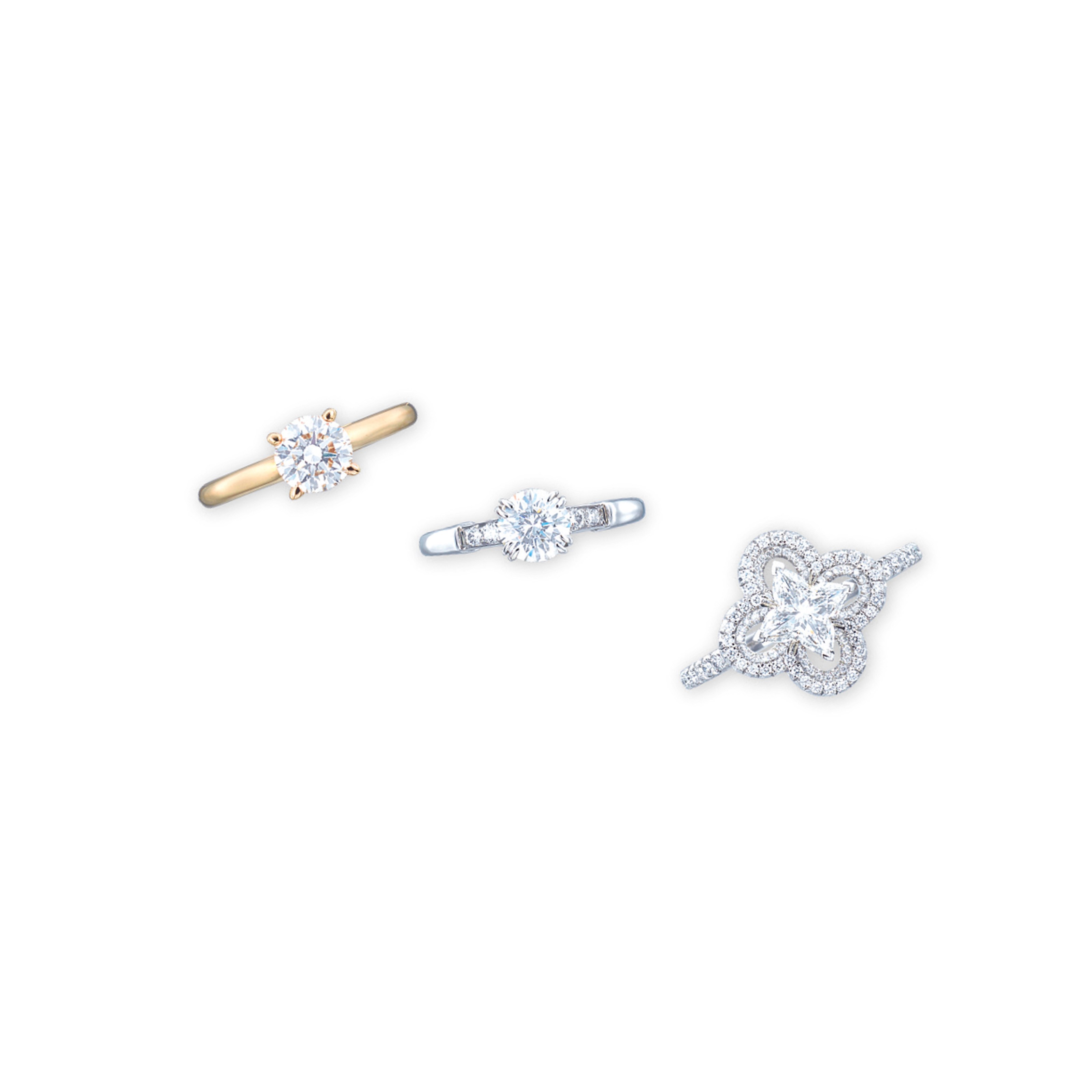 THREE SIGNED DIAMOND RINGS