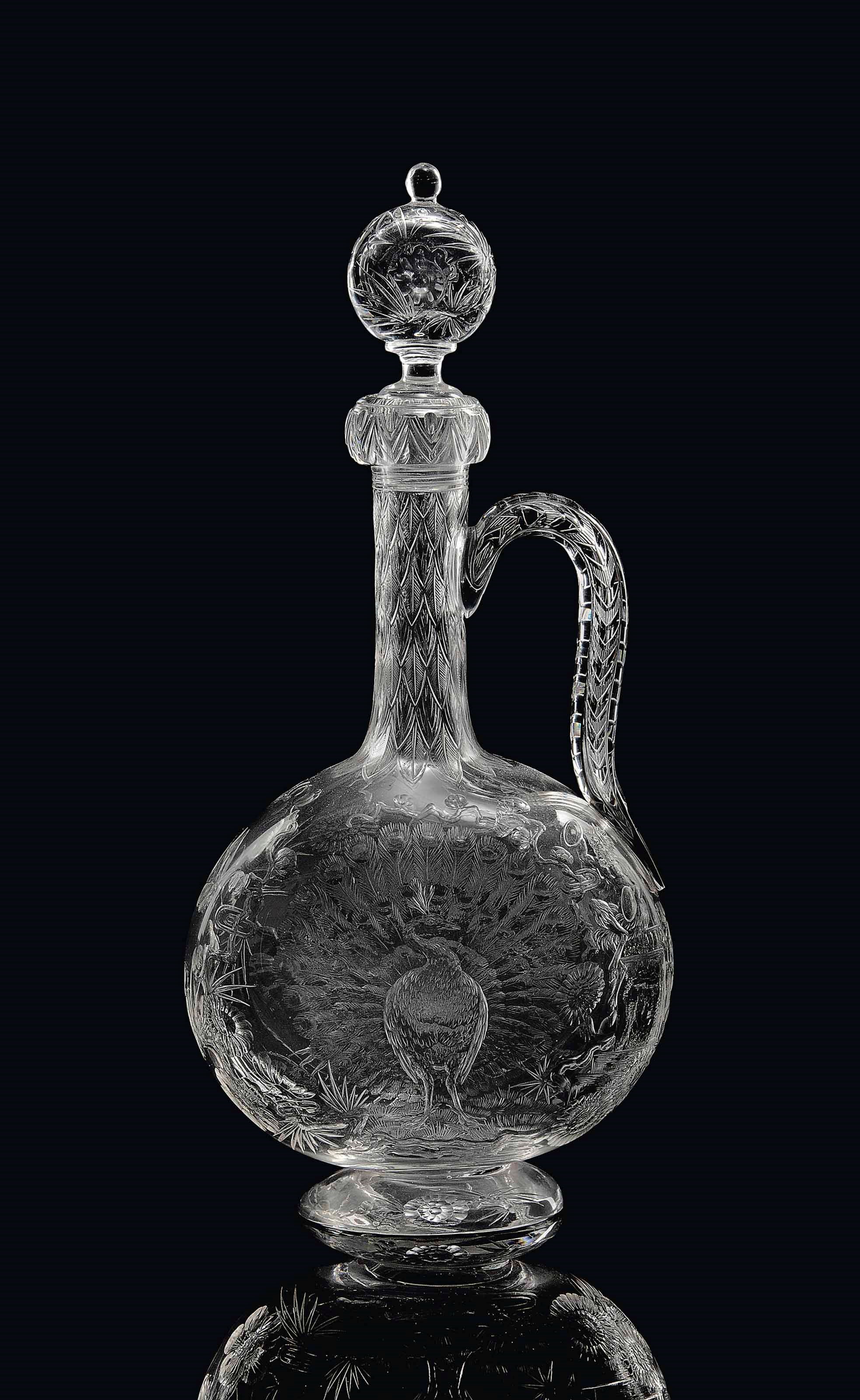 A STOURBRIDGE 'ROCK CRYSTAL' ENGRAVED GLASS CLARET DECANTER AND STOPPER