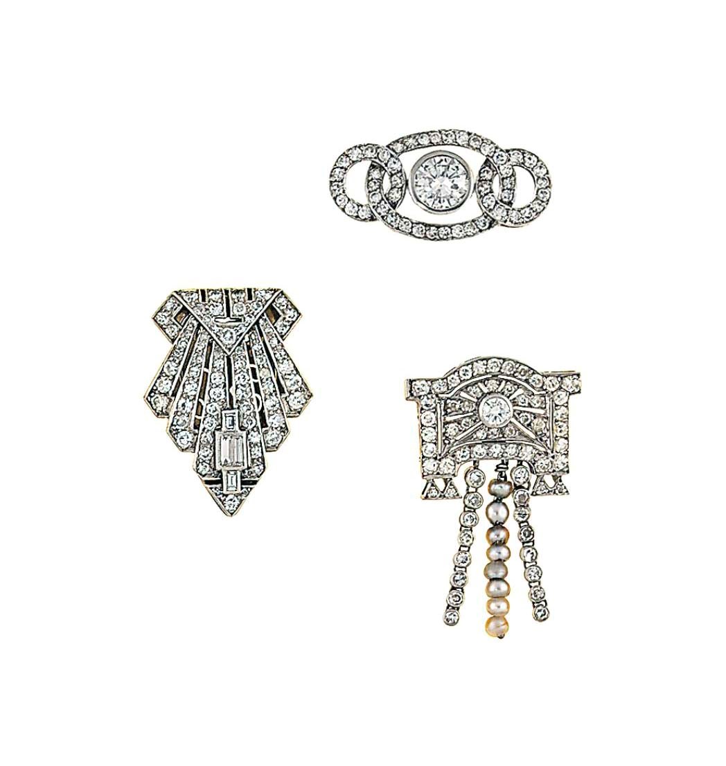 Three diamond-set brooches