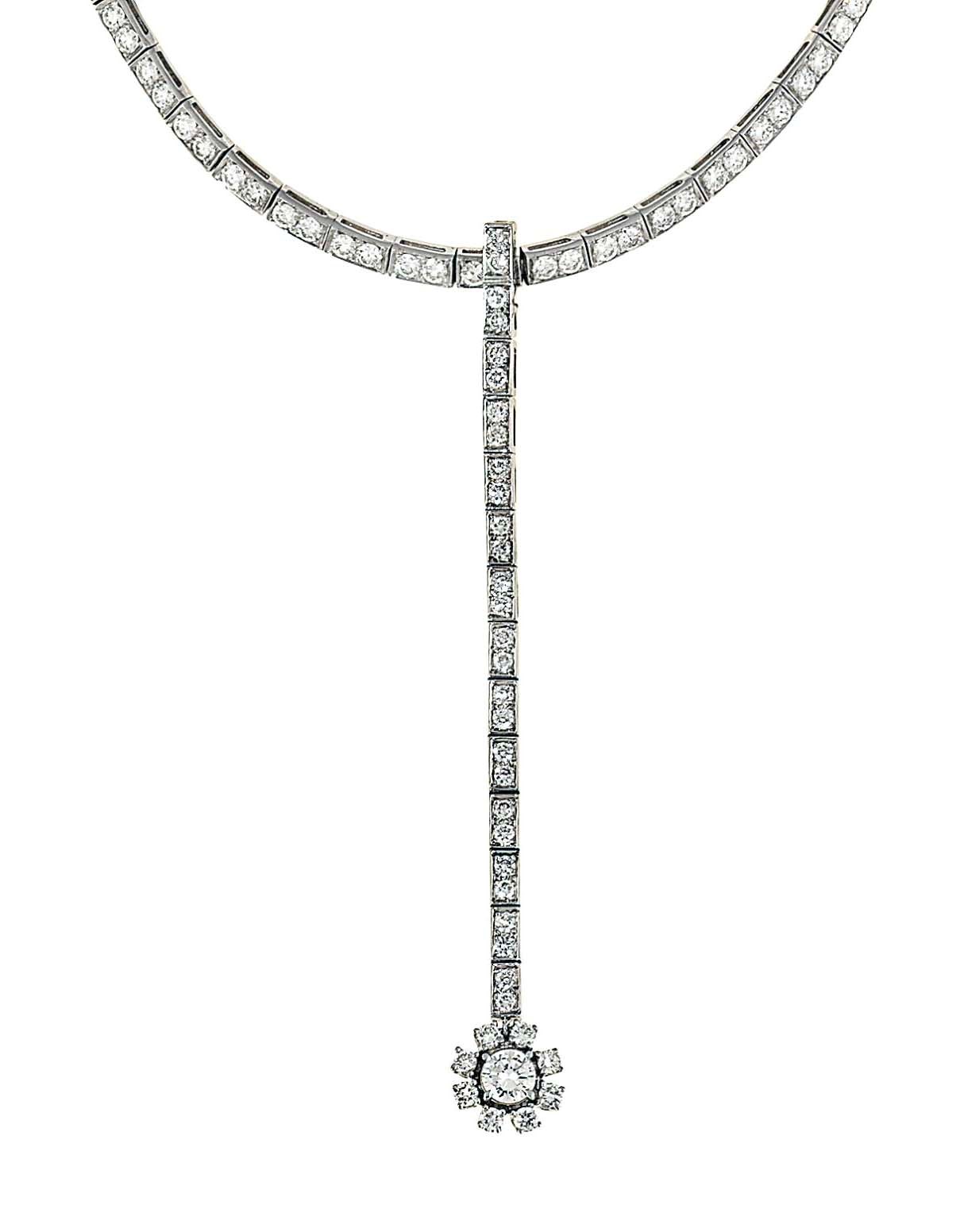 A diamond-set necklace and ring