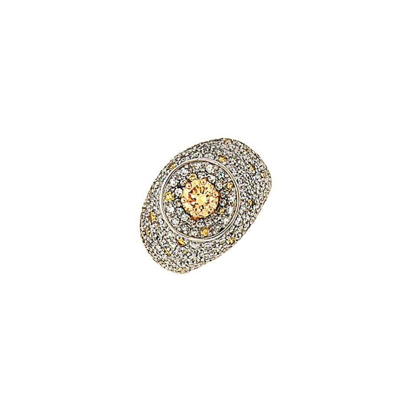 A coloured diamond and diamond dress ring