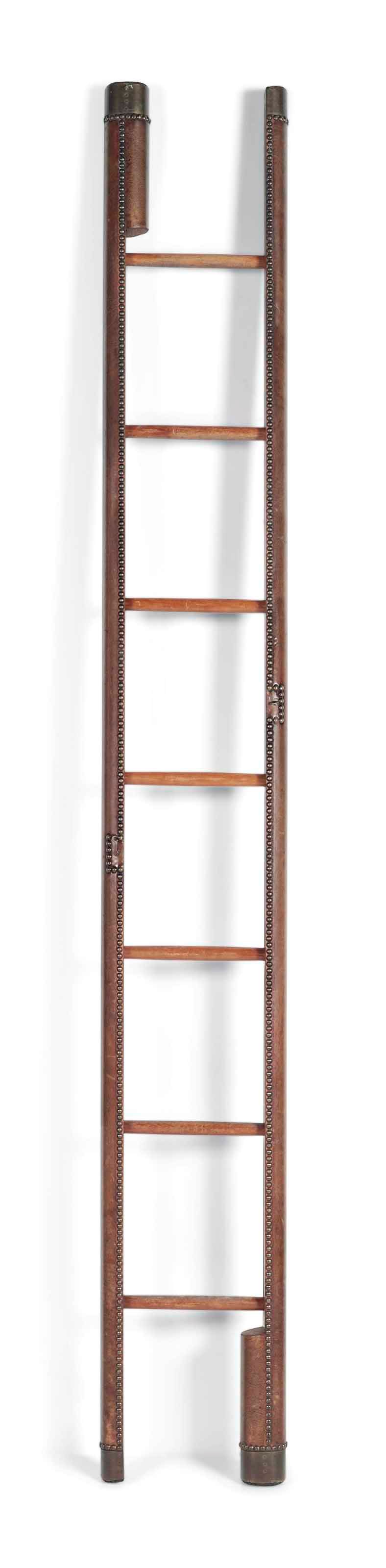 A LEATHER AND MAHOGANY METAMORPHIC LIBRARY LADDER