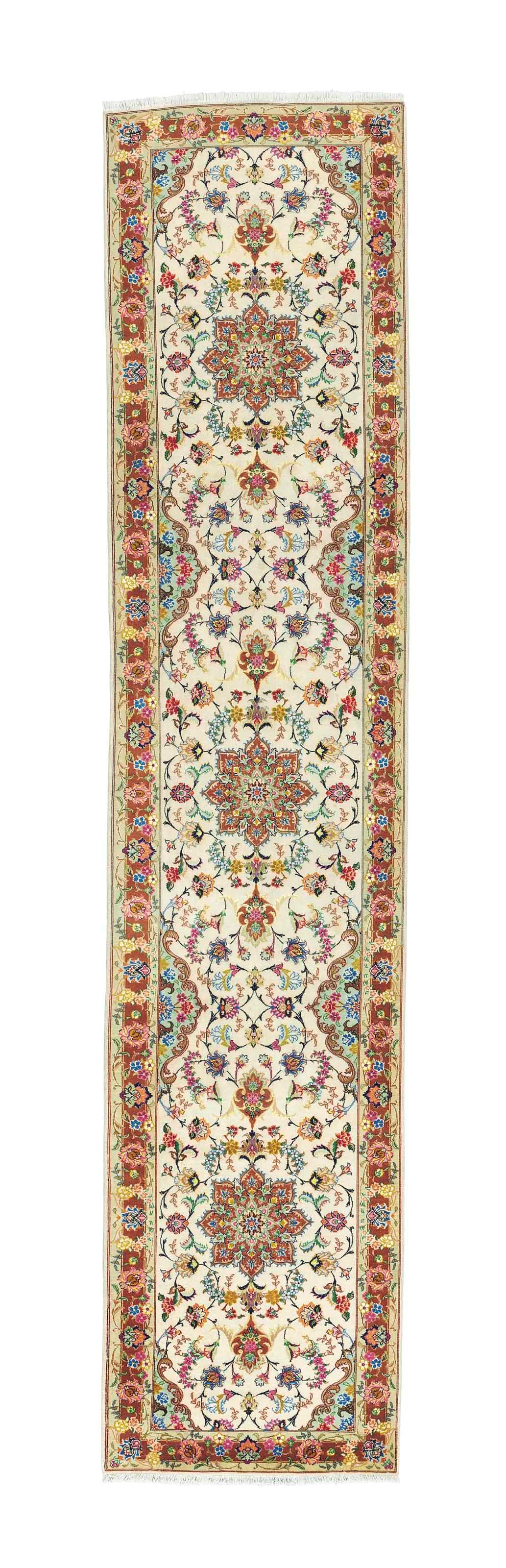 A very fine part silk Tabriz runner