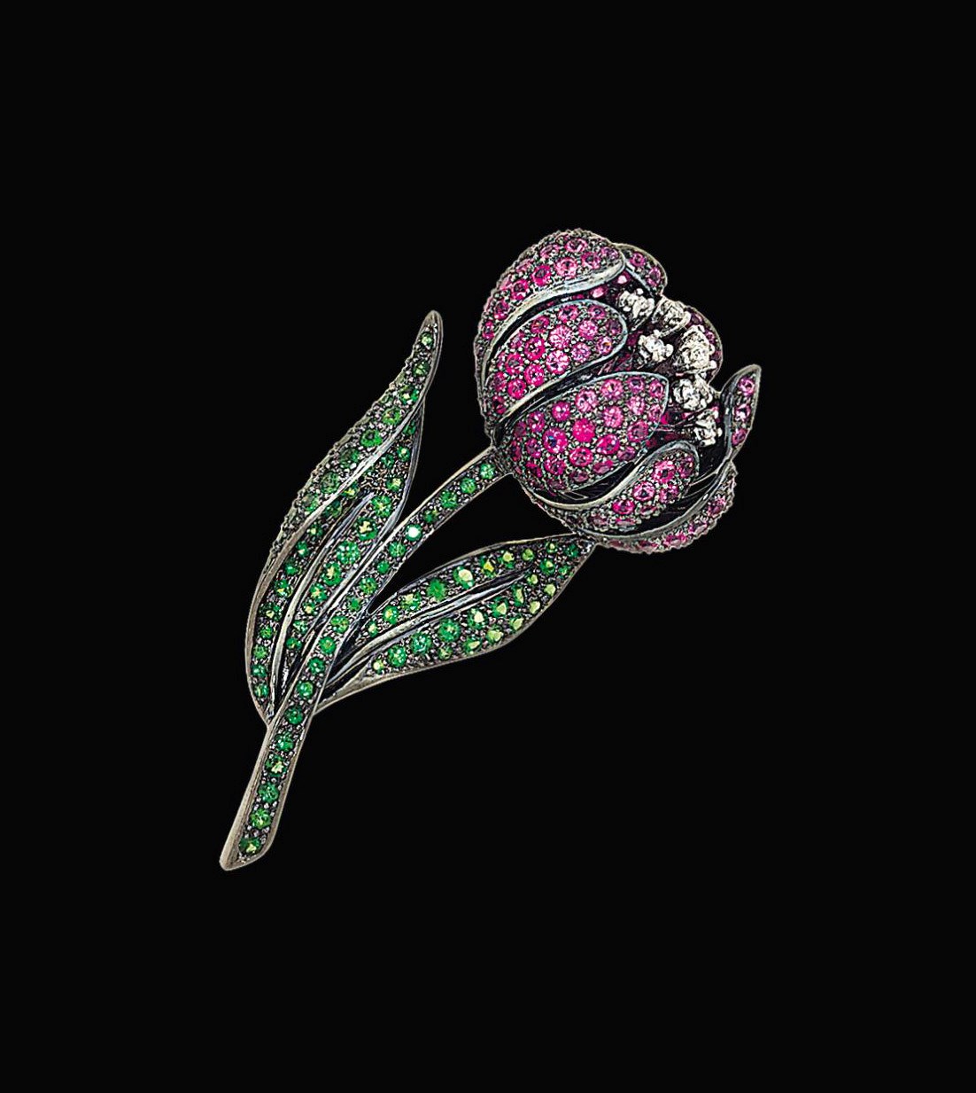 A gem-set flower brooch
