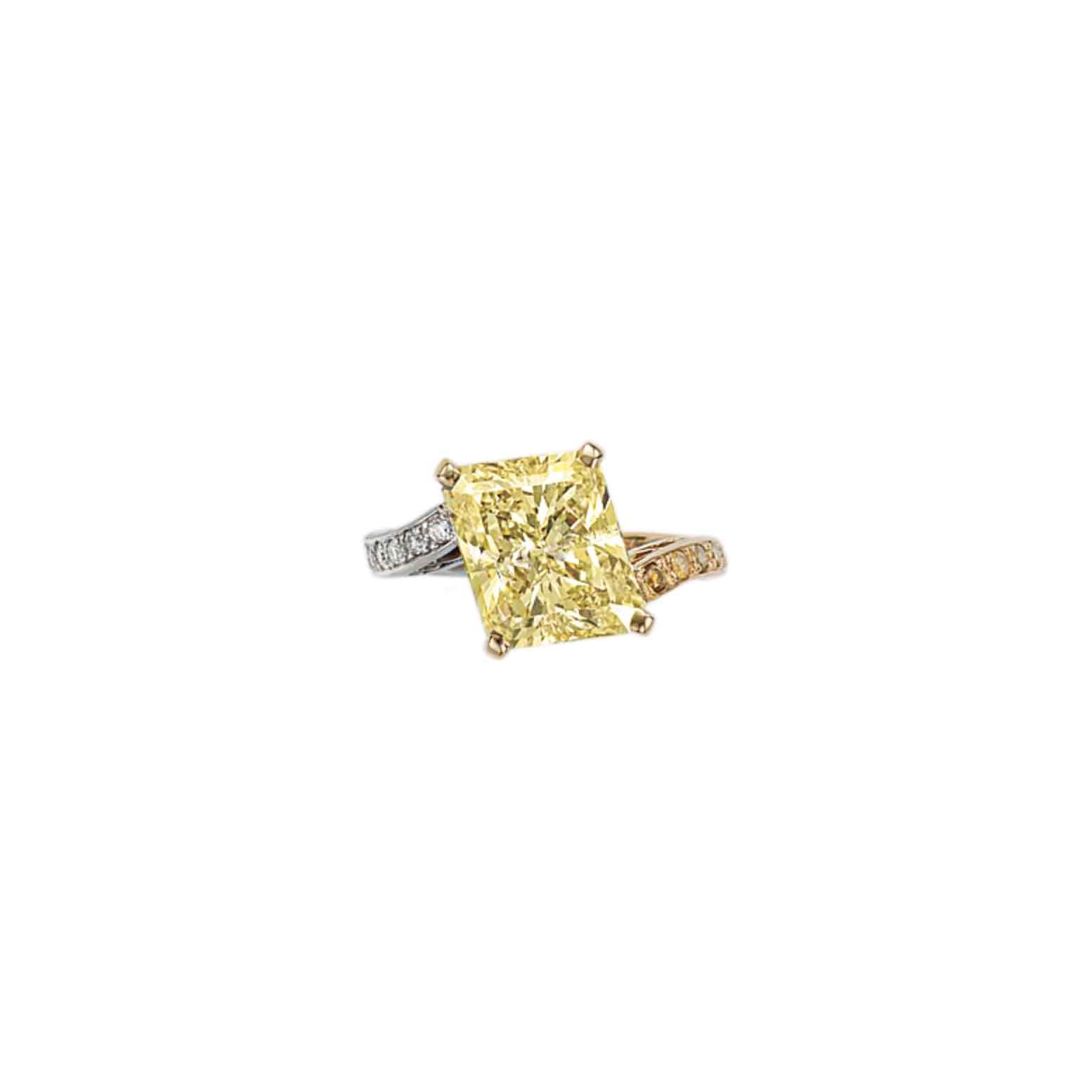 A COLORED DIAMOND AND DIAMOND RING