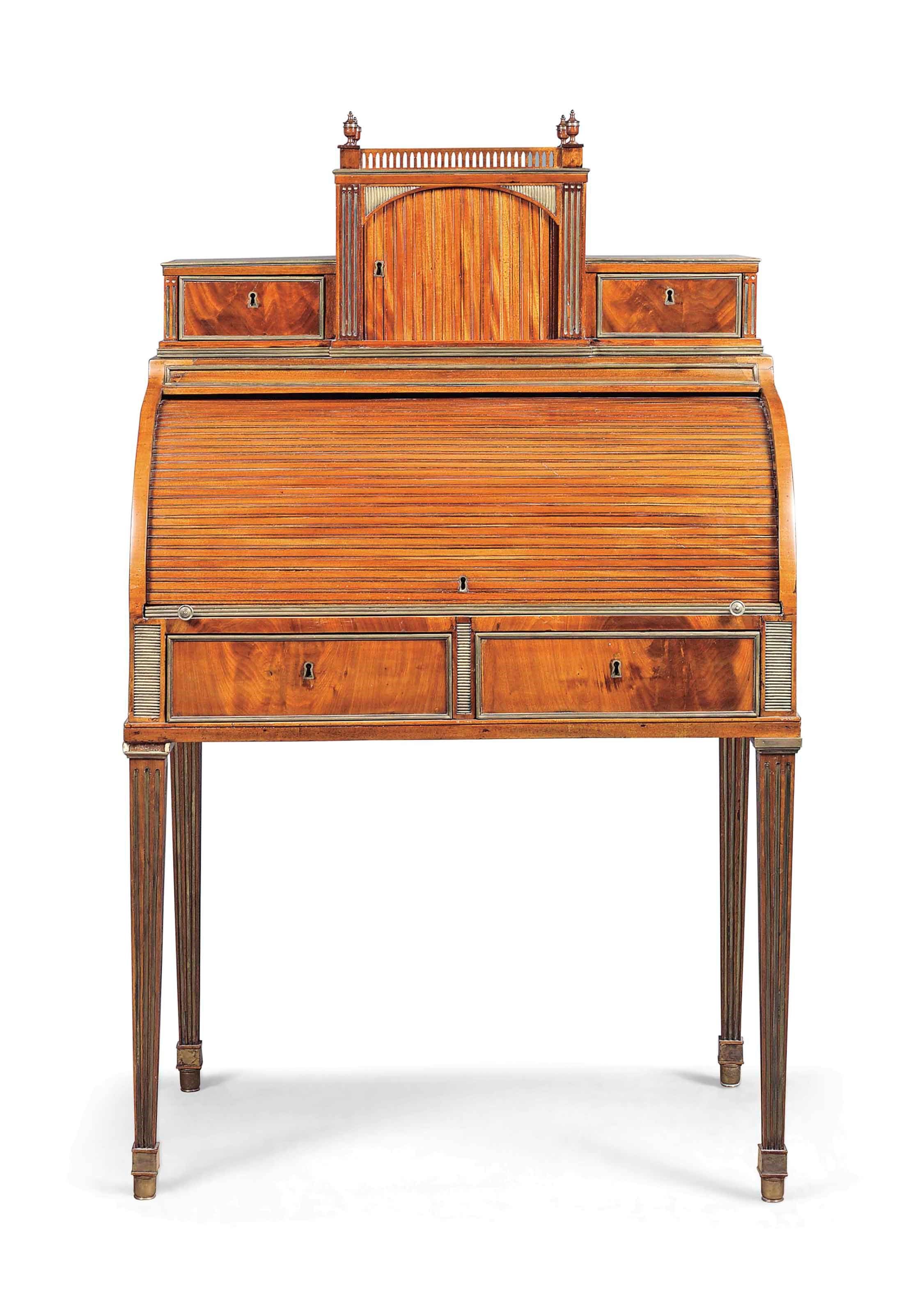 A BALTIC BRASS-MOUNTED MAHOGANY CYLINDER BUREAU