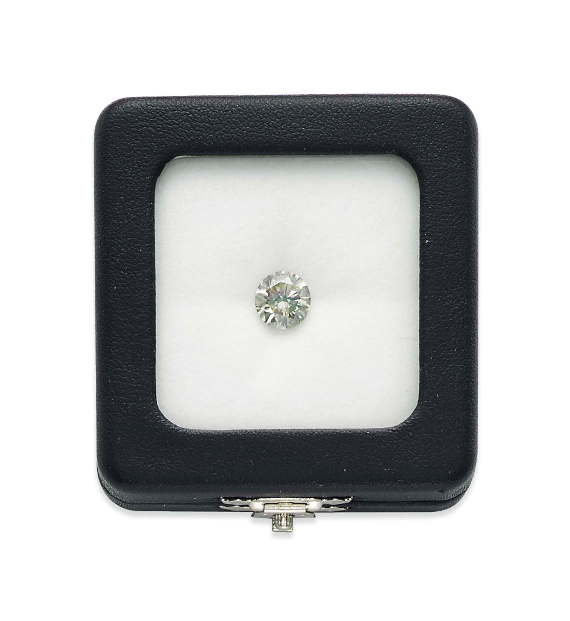 AN UNMOUNTED COLOURED DIAMOND