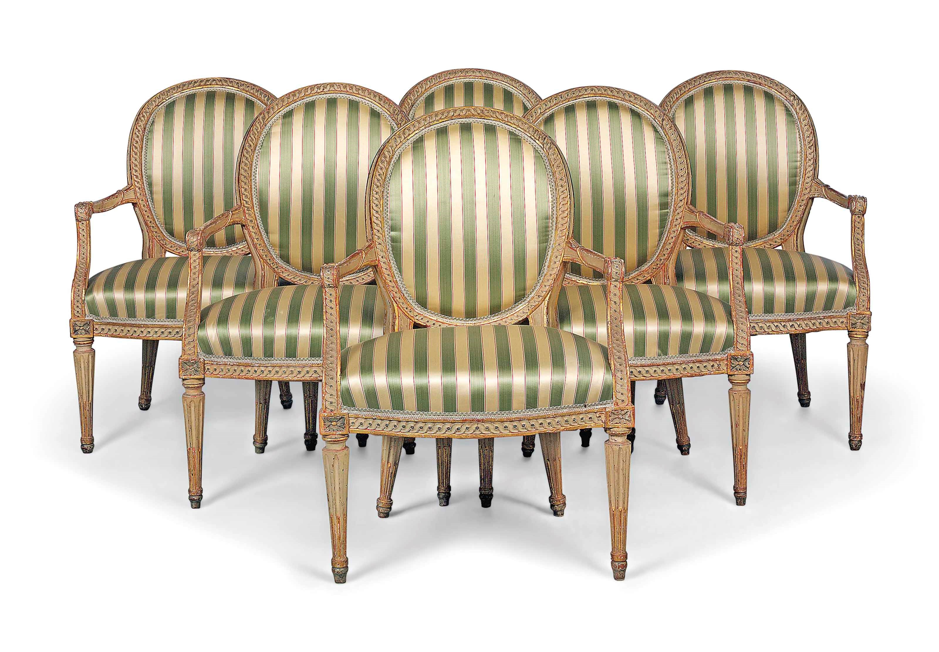 A SET OF SIX NORTH ITALIAN PARCEL-GILT AND PALE GREY-PAINTED FAUTEUILS