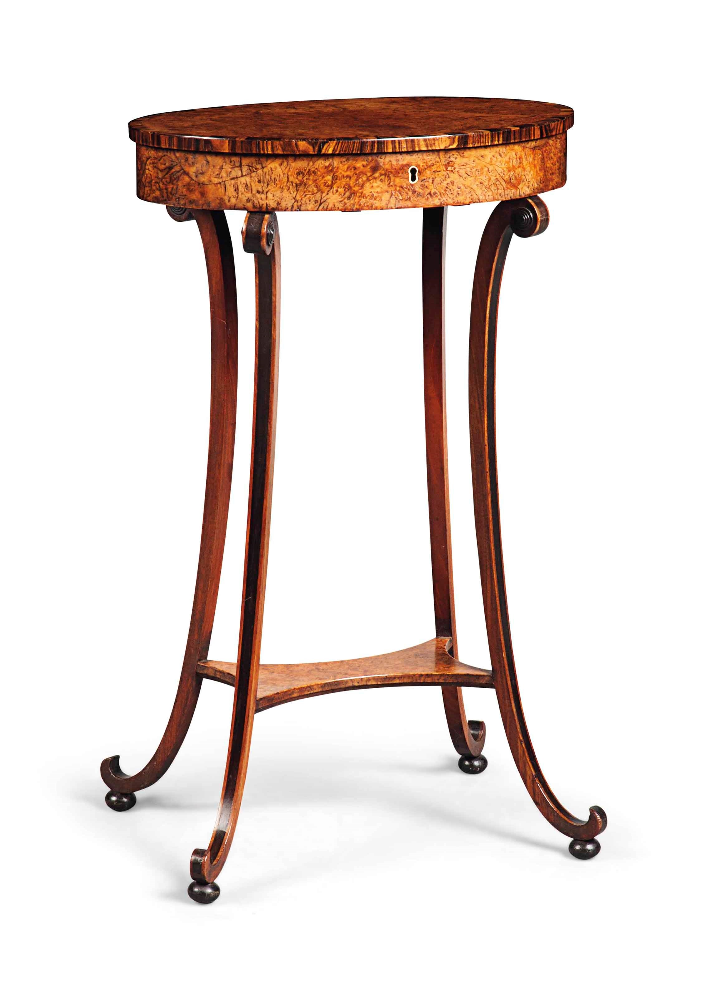 A LATE GEORGE III CALAMANDER-CROSSBANDED AND EBONY-INLAID BURR YEW OCCASIONAL TABLE