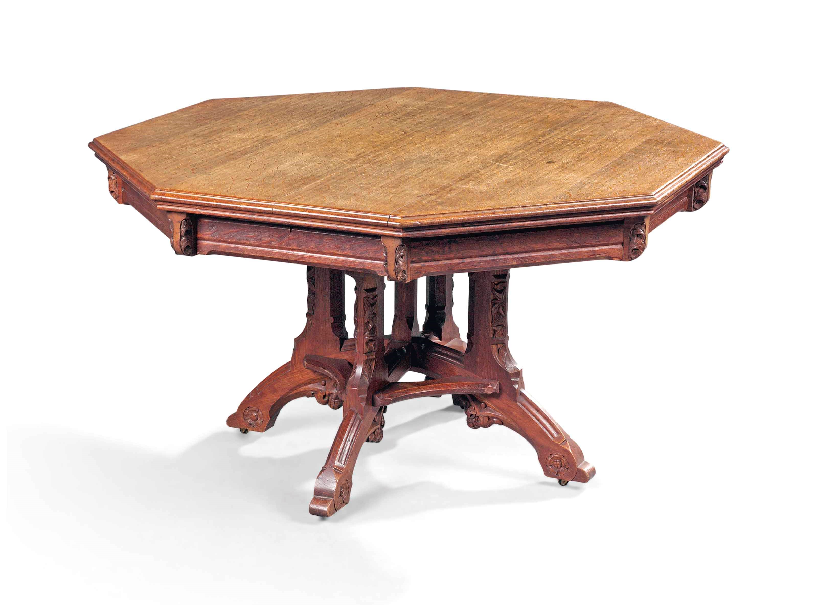A VICTORIAN 'GOTHIC' OAK LIBRARY DRUM TABLE