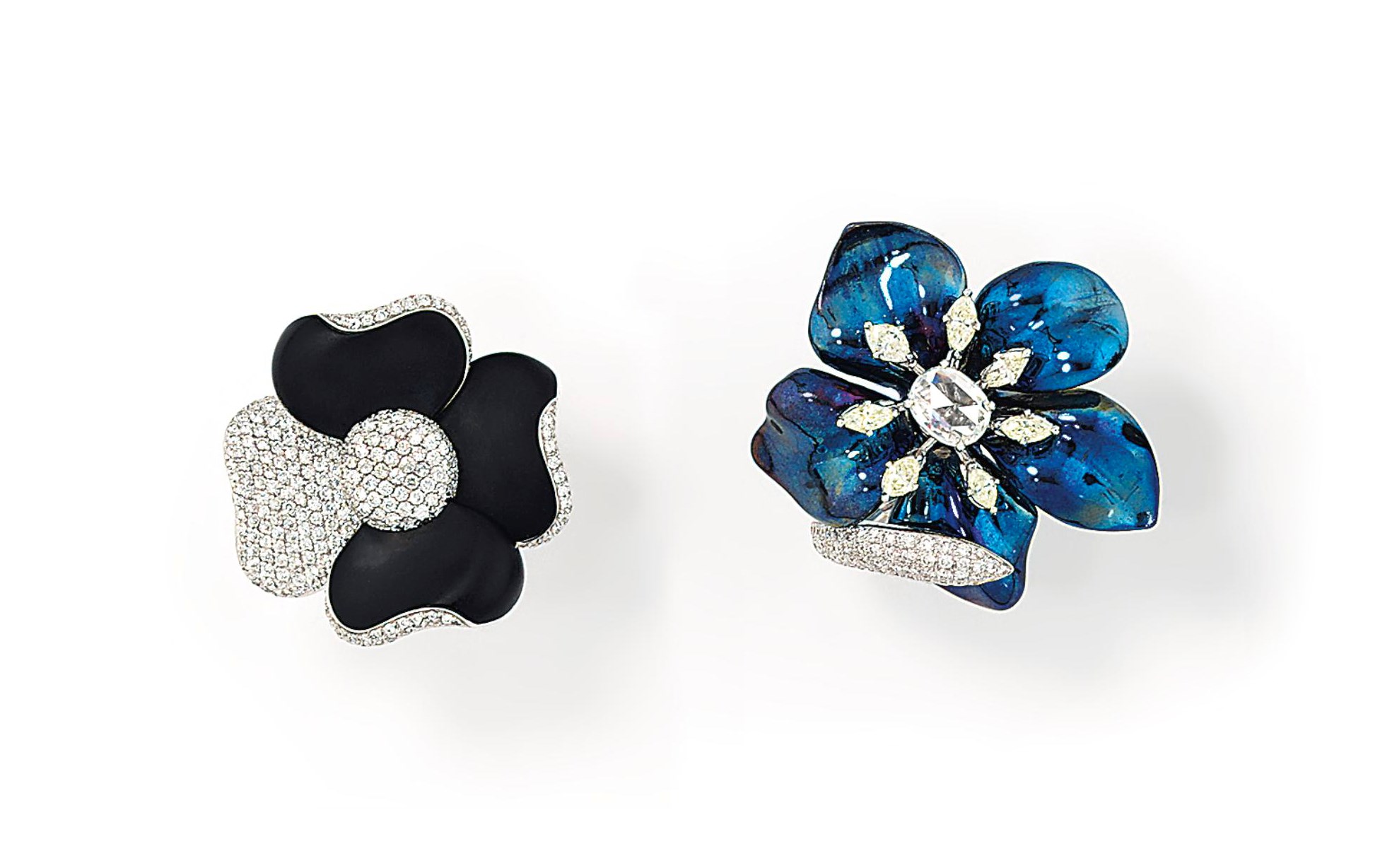 Two diamond-set flower rings