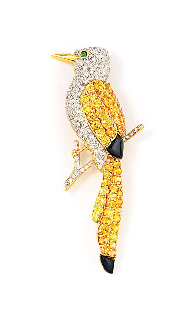 A gem-set bird brooch