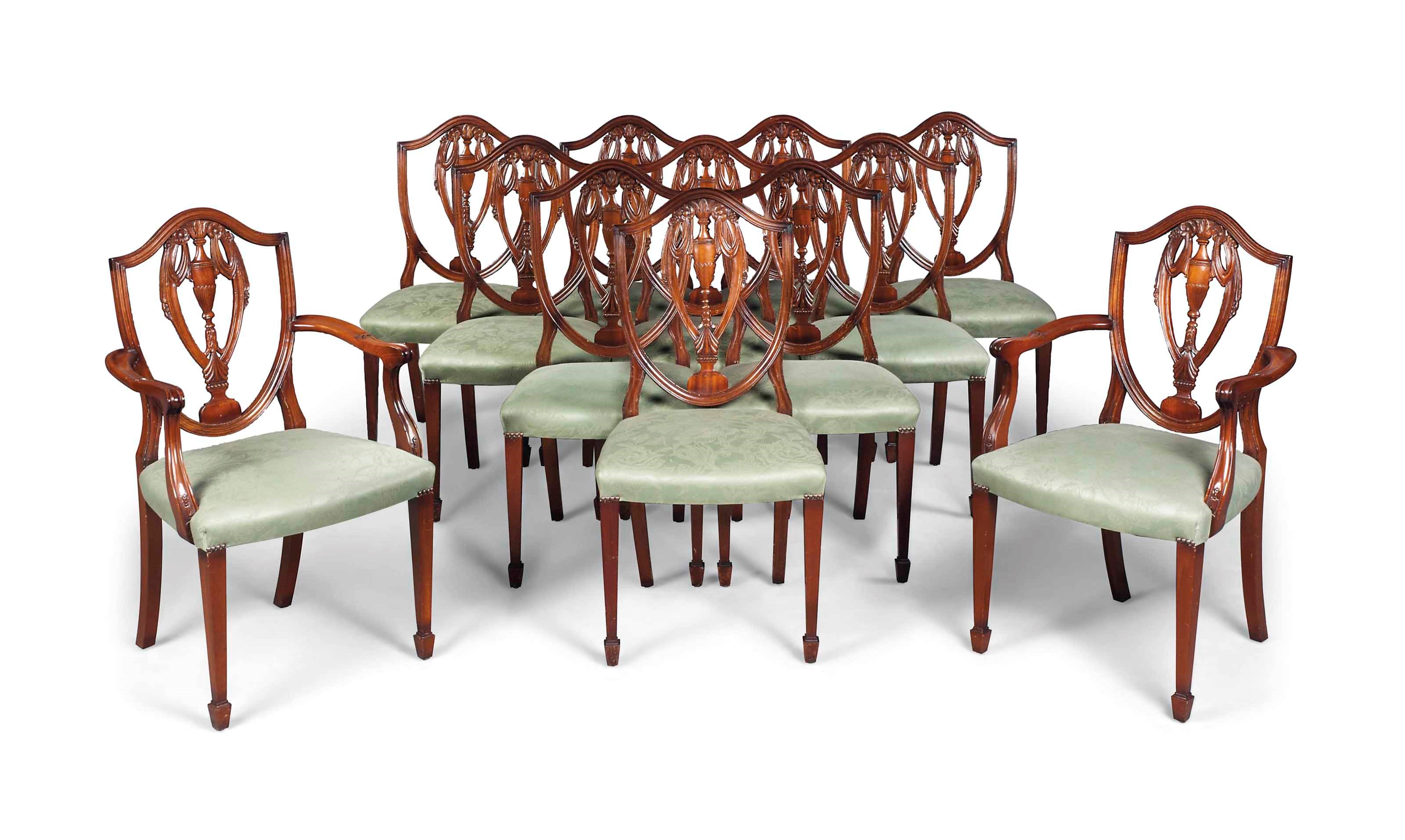 A SET OF TWELVE MAHOGANY DINING CHAIRS