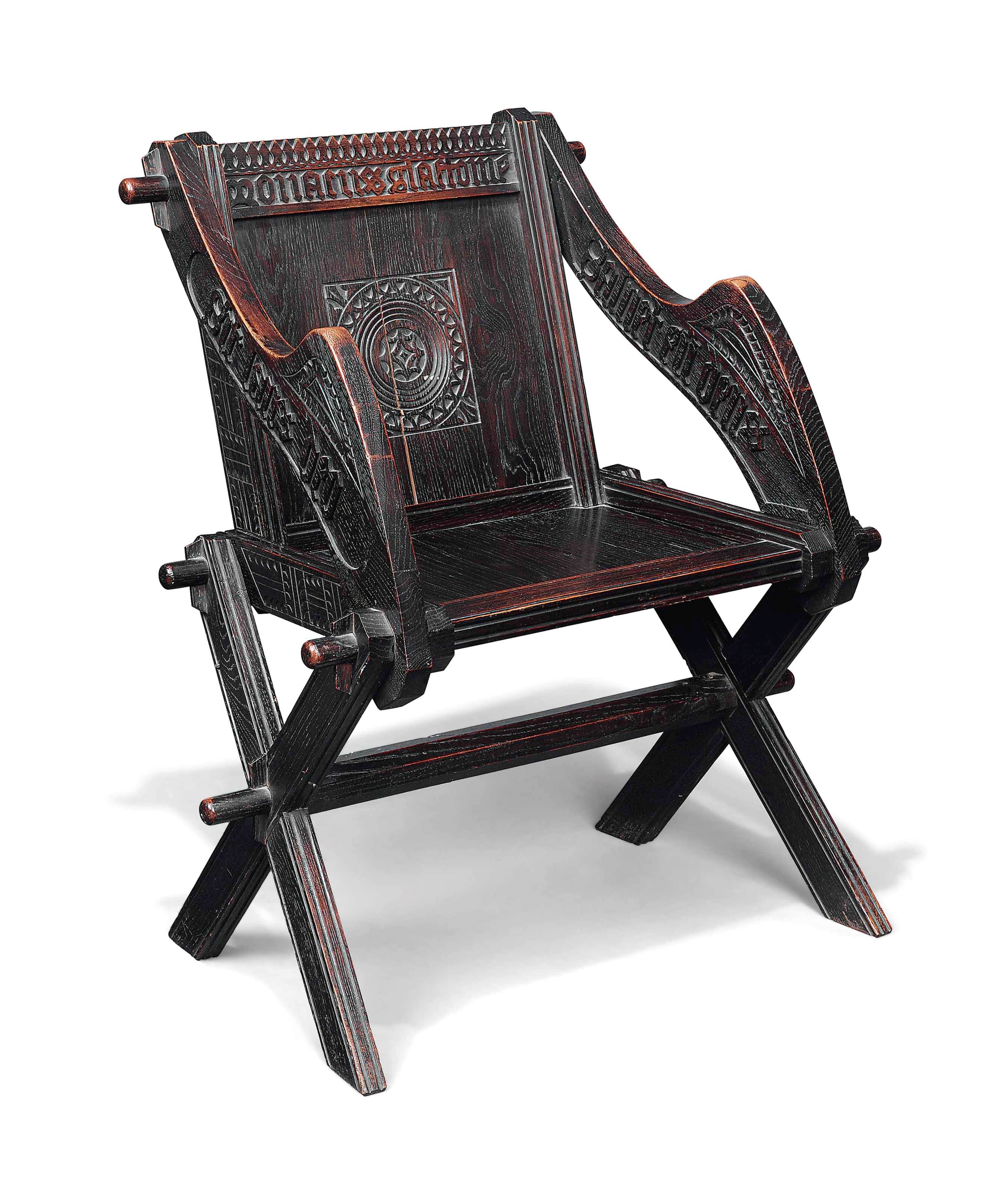 A VICTORIAN OAK 'GLASTONBURY' ARMCHAIR