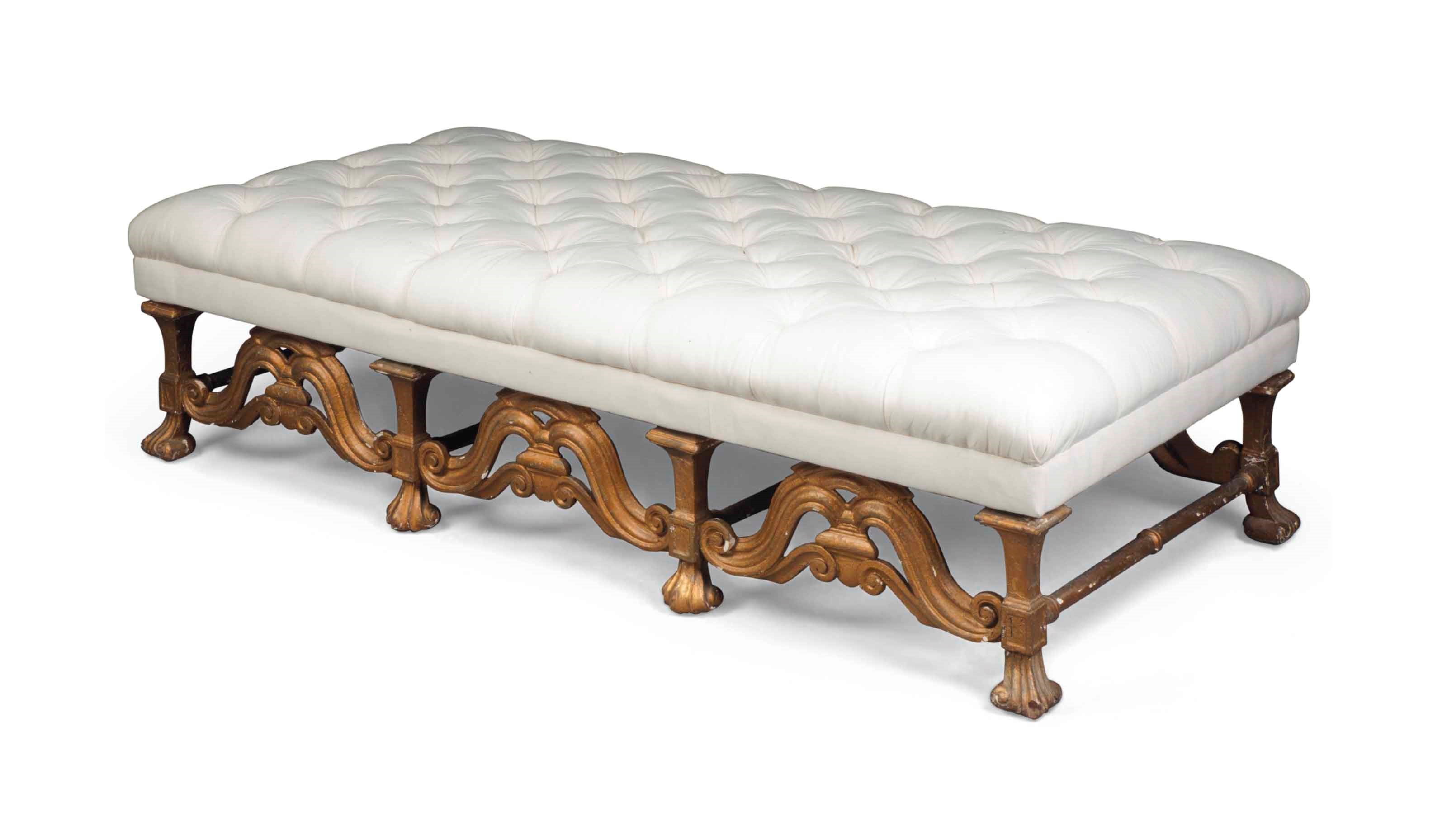 A LARGE BUTTONED STOOL