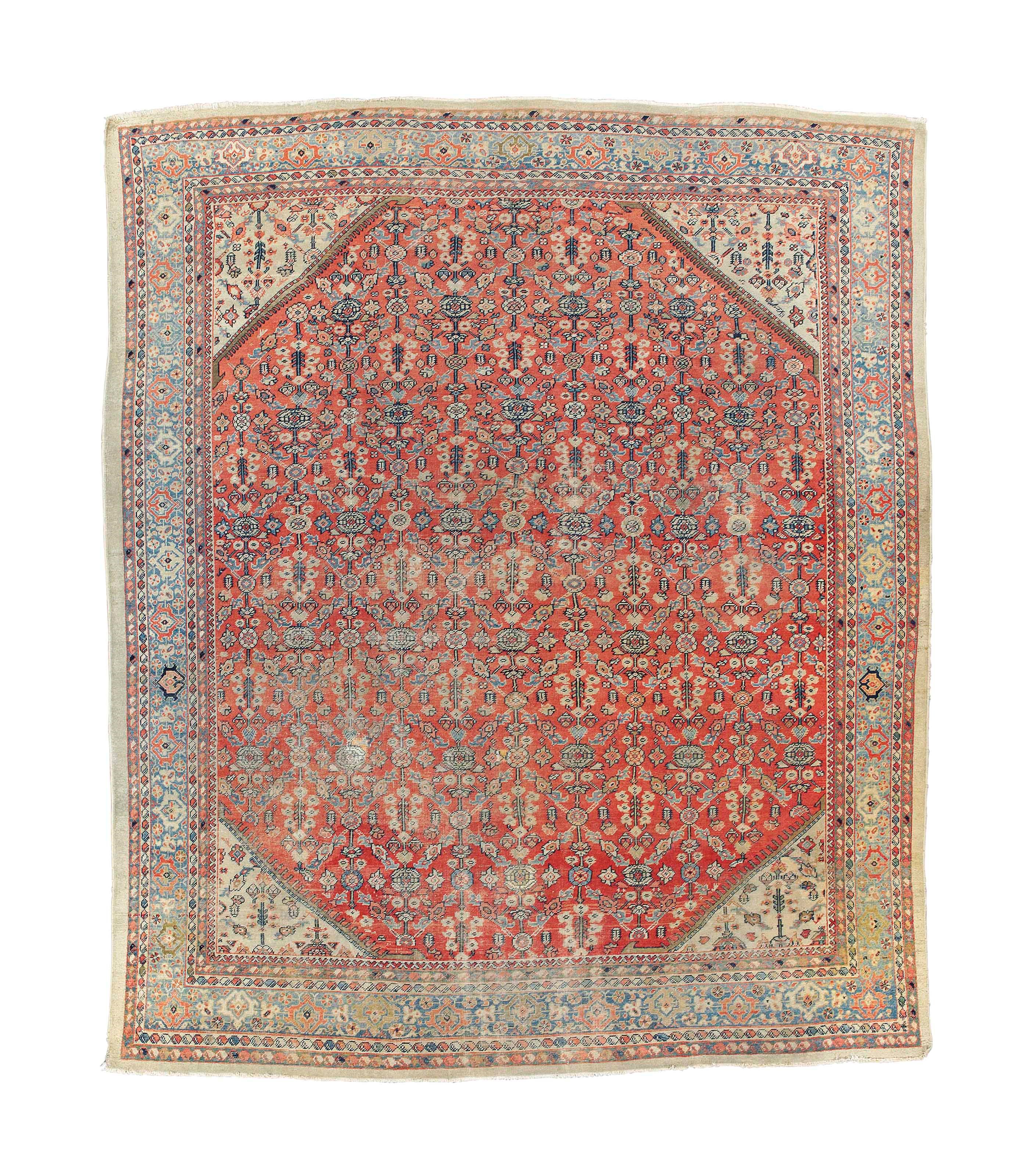 An antique Mahal carpet