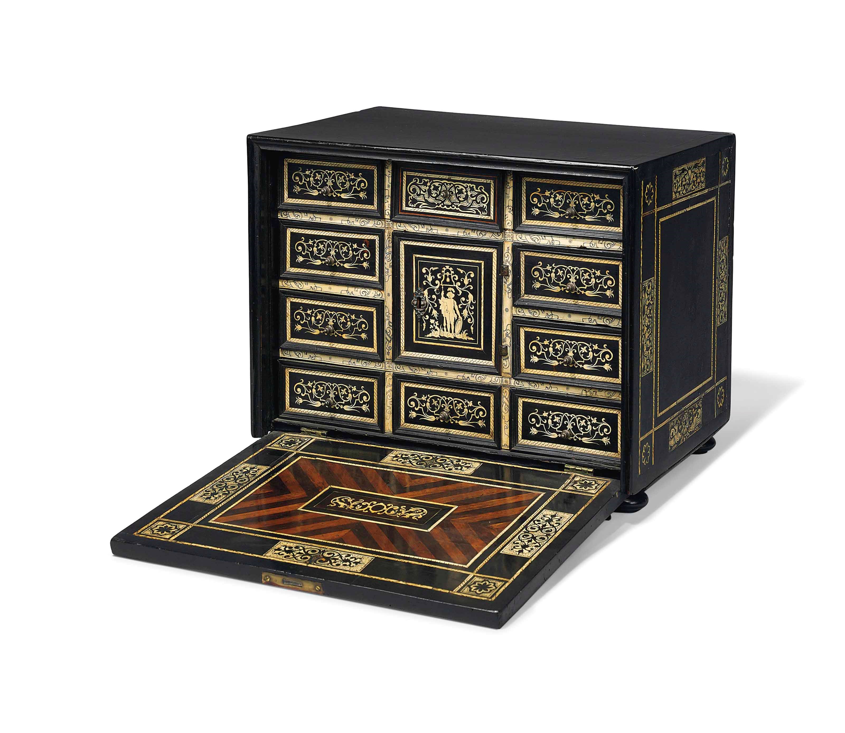 A NORTH ITALIAN BONE AND IVORY-INLAID EBONY TABLE CABINET