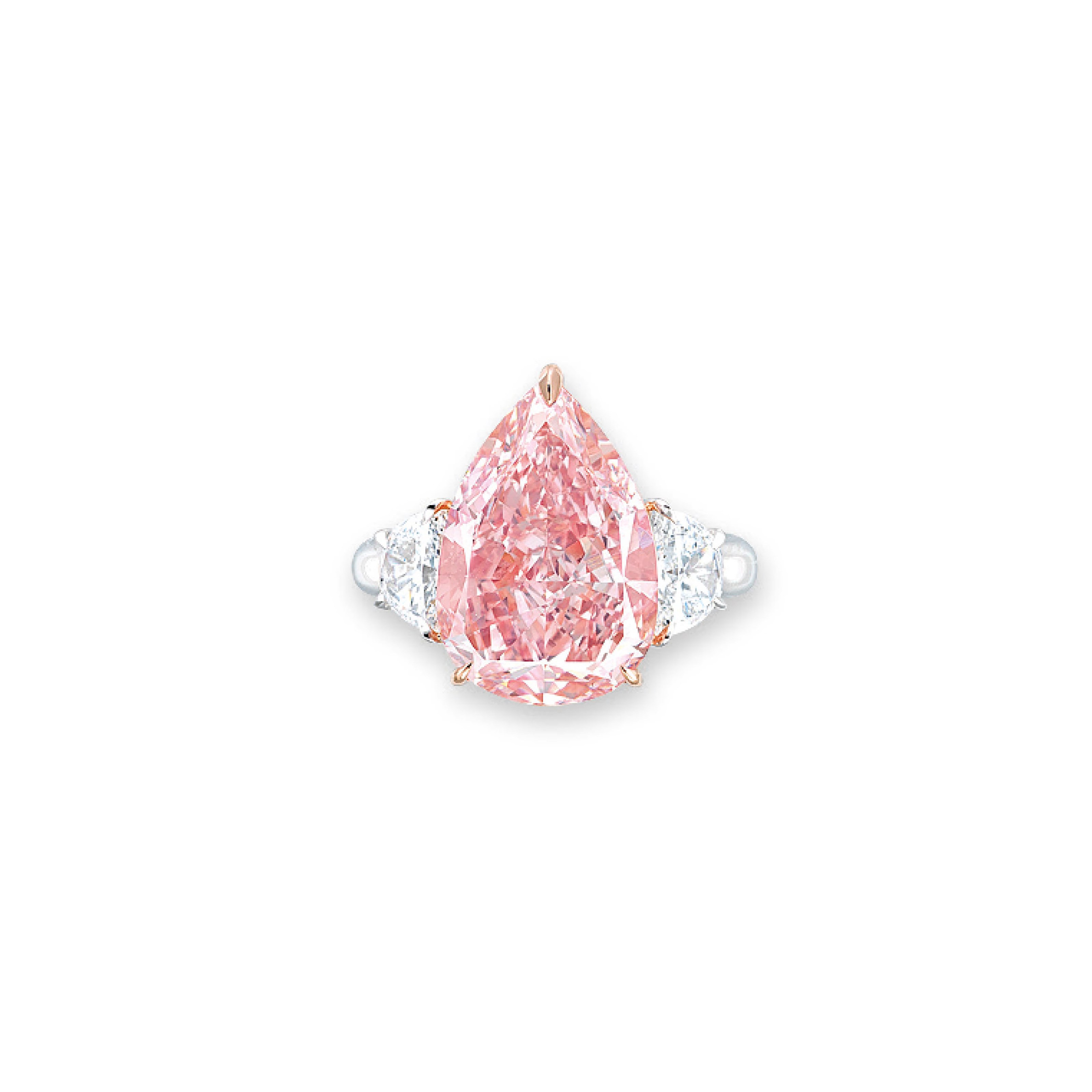A RARE COLOURED DIAMOND AND DIAMOND RING