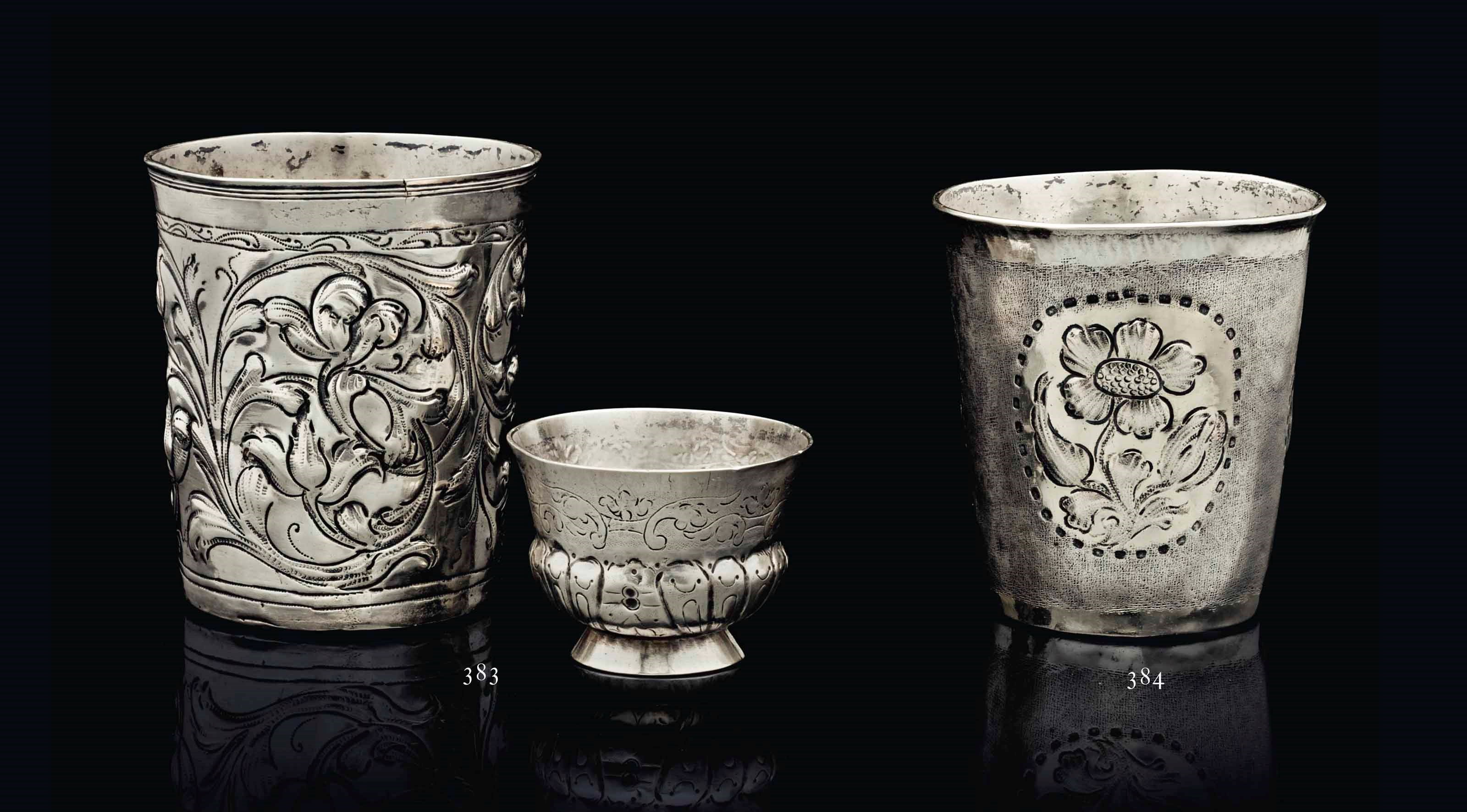 A PARCEL-GILT SILVER BEAKER