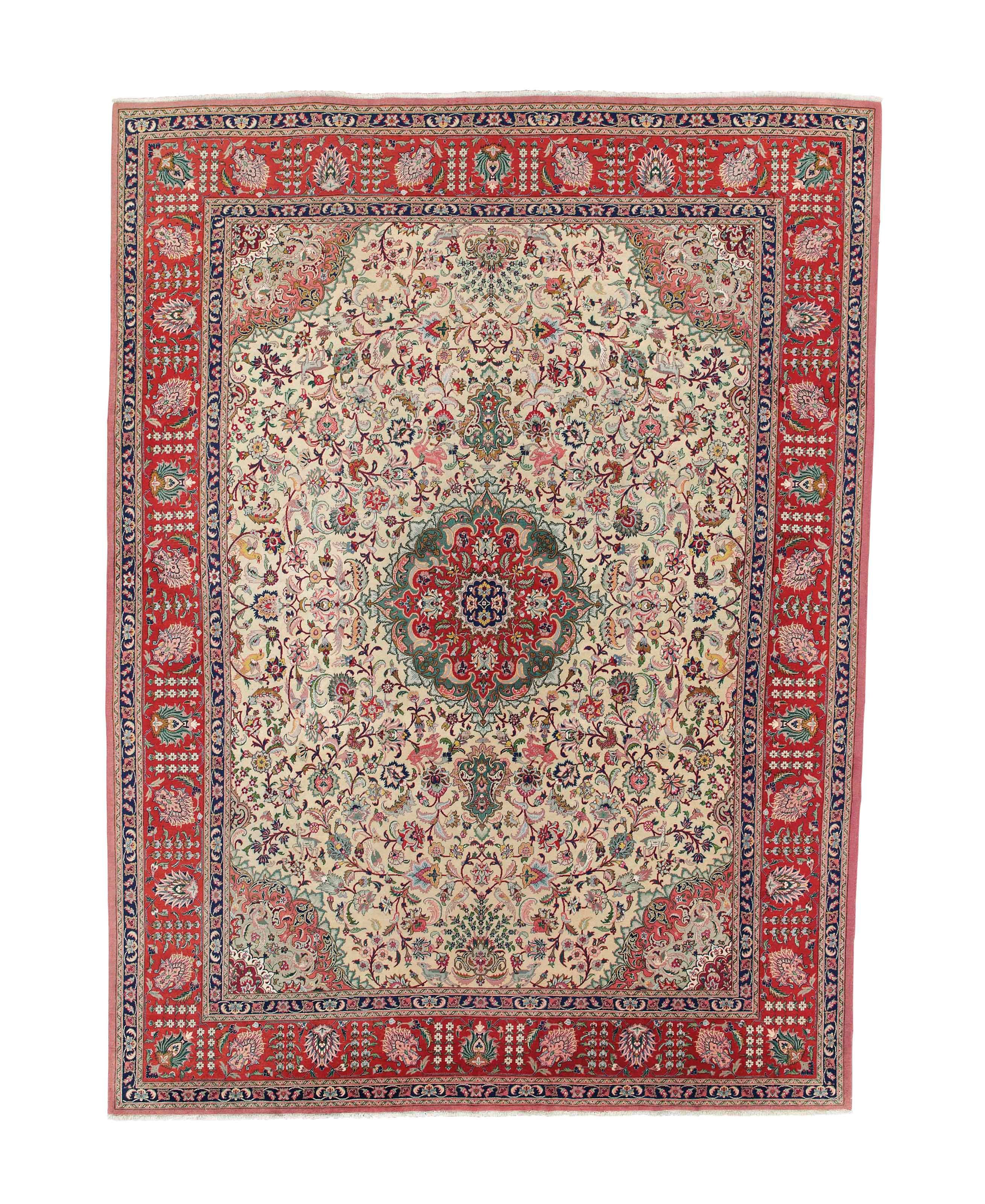 A fine part silk Tabriz carpet