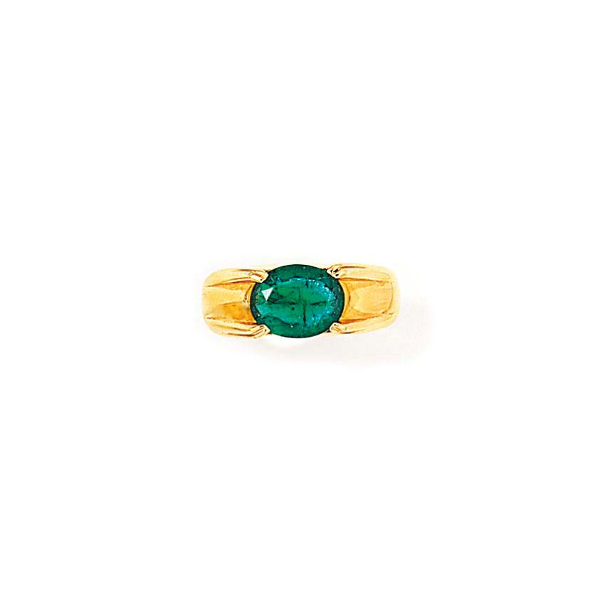 AN EMERALD RING